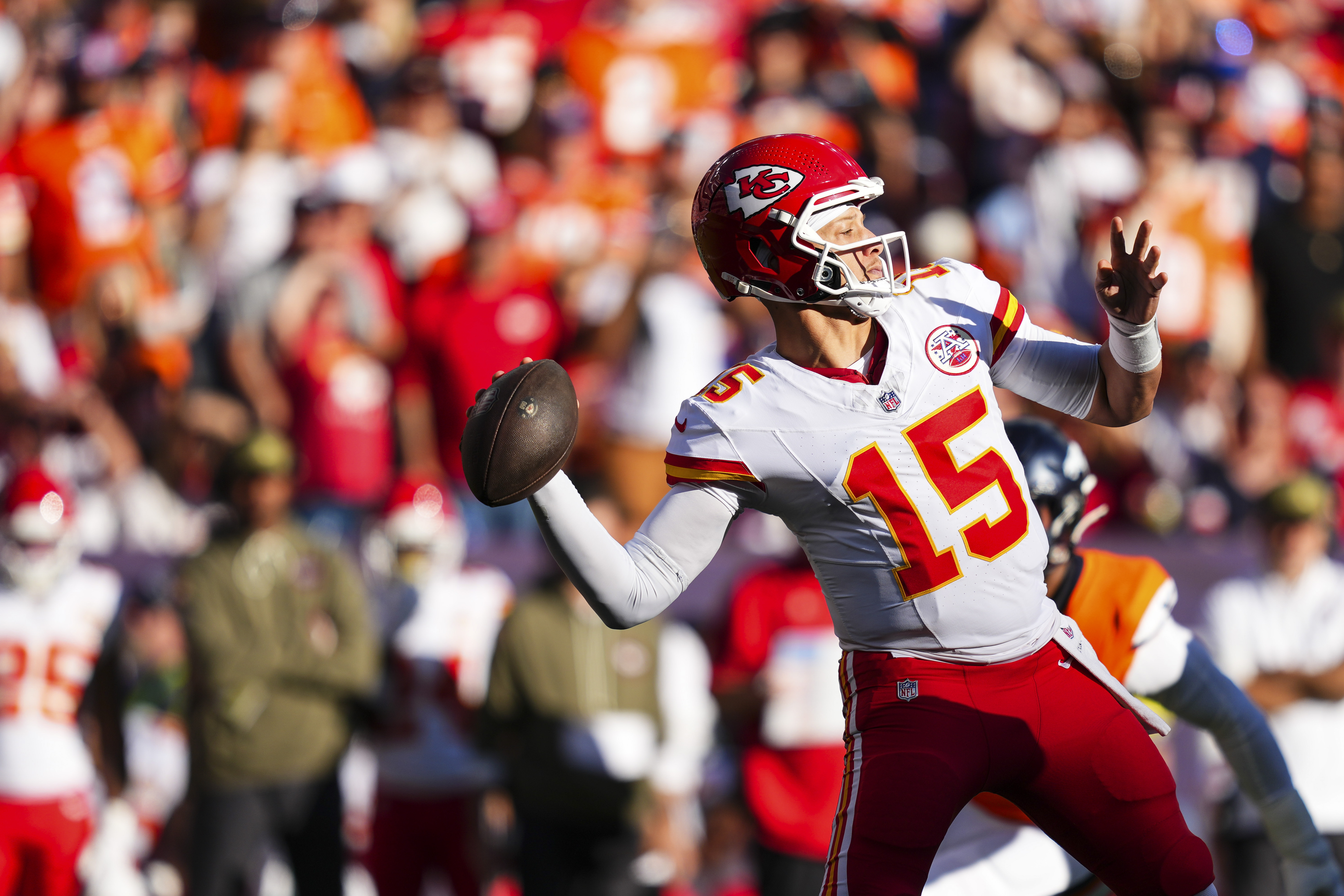 DENVER, CO - NOVEMBER 16: Patrick Mahomes #15 of the Kansas City Chiefs throws the ball during an NFL football game against the Denver Broncos at Empower Field at Mile High on November 16, 2025 in Denver, Colorado. (Photo by Cooper Neill/Getty Images)