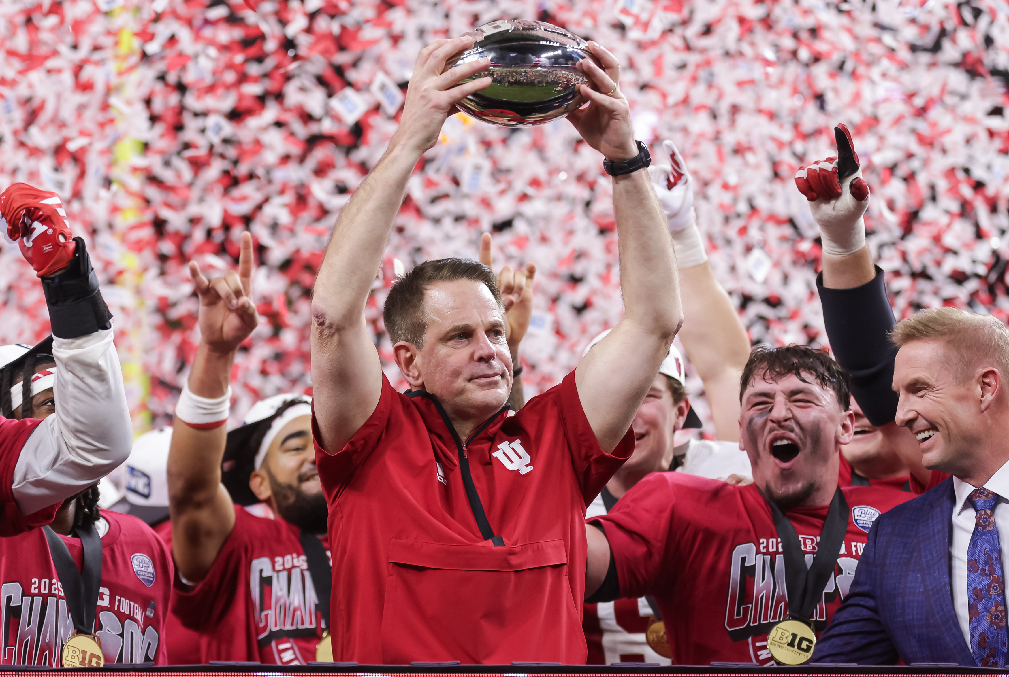 INDIANAPOLIS, INDIANA - DECEMBER 6: Head coach Curt Cignetti of the Indiana Hoosiers celebrates with the Big Ten trophy after the 2025 Big Ten Championship game against the Ohio State Buckeyes at Lucas Oil Stadium on December 6, 2025 in Indianapolis, Indiana. (Photo by Michael Hickey/Getty Images)