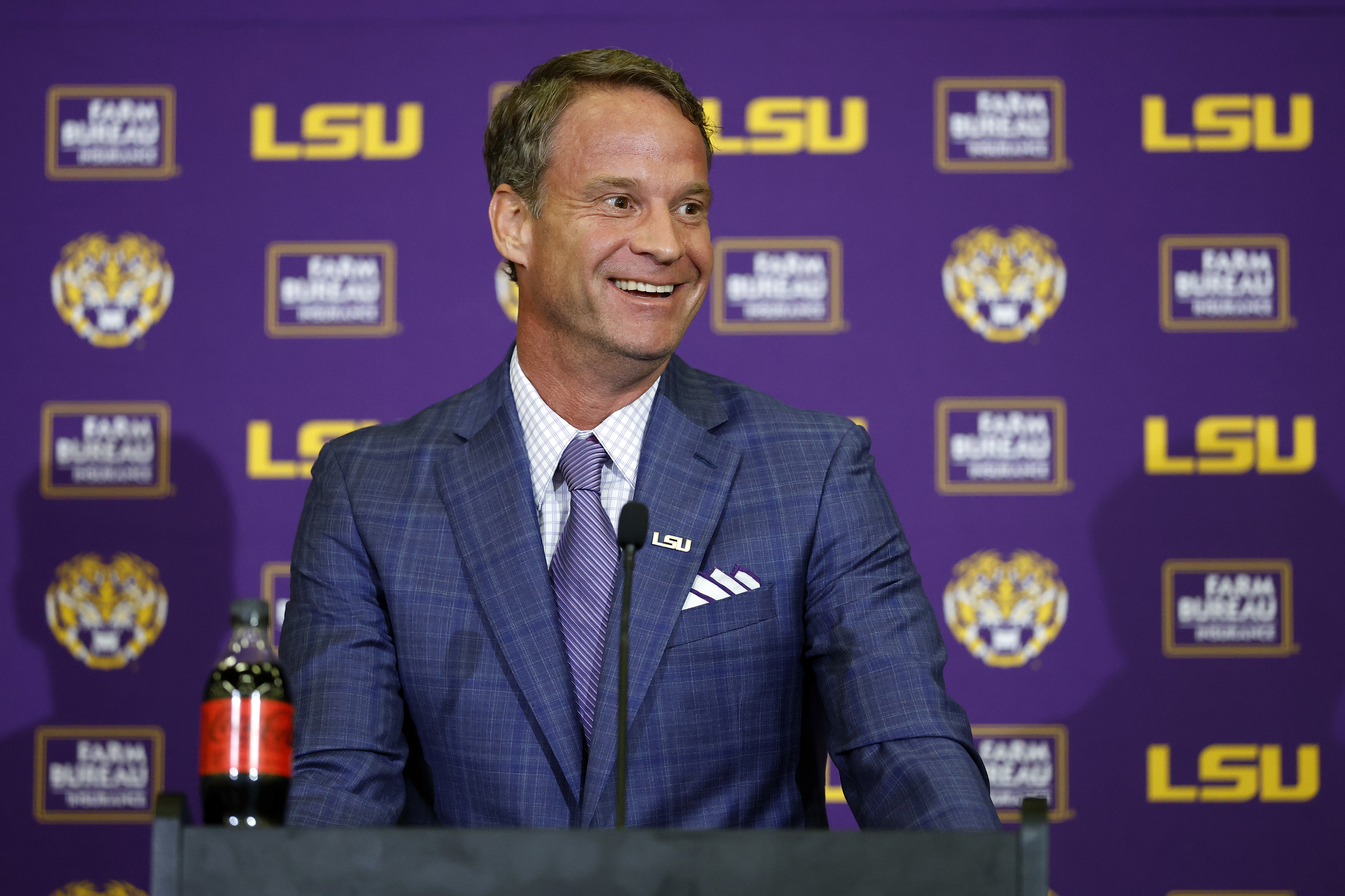 An airport hangar, pools of money and 'the best job in America': How LSU lured Lane Kiffin from Ole Miss