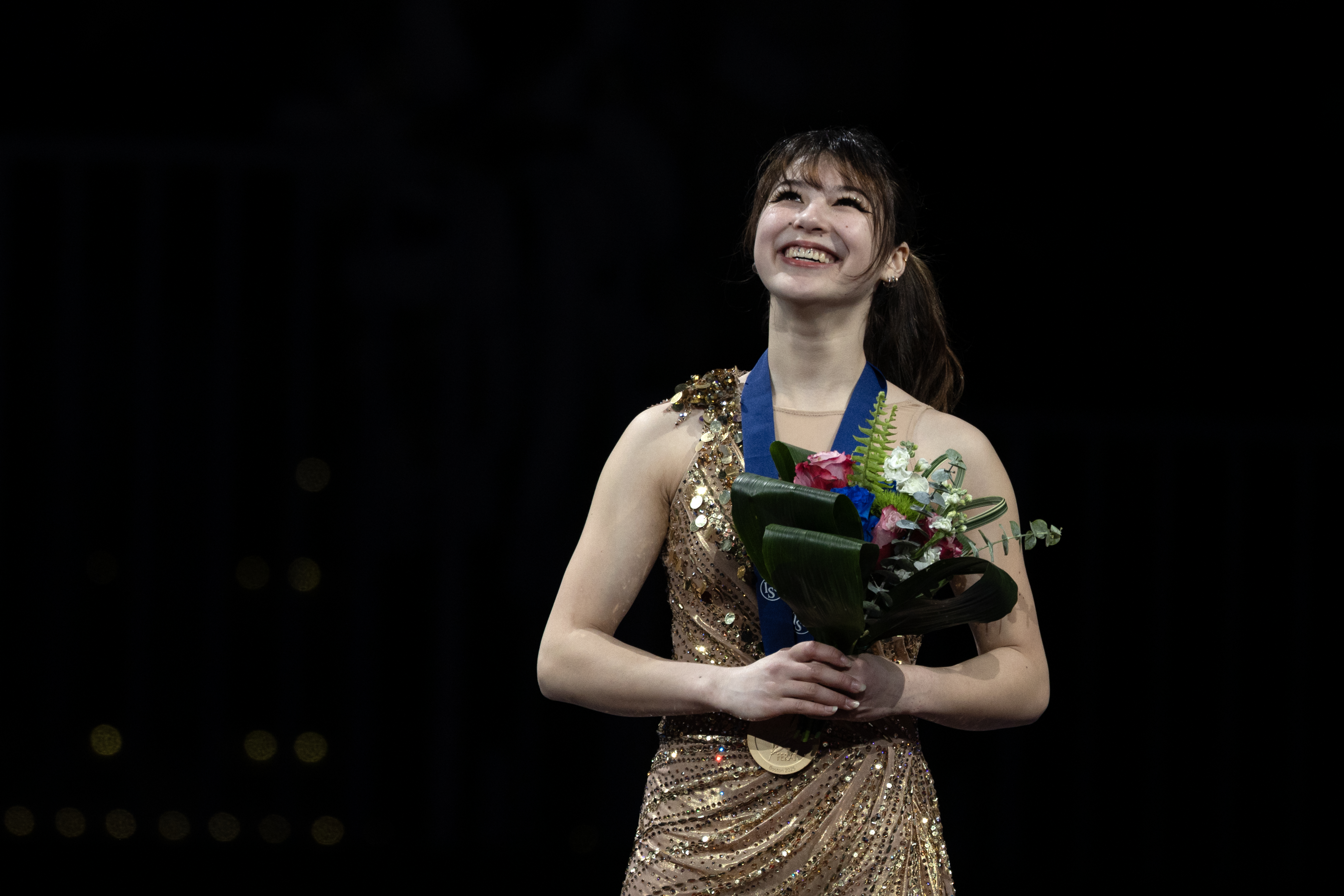 BOSTON, UNITED STATES: MARCH 28: Alysa Liu of the United States celebrates on the podium after her world championship win in the women's competition at the ISU World Figure Skating Championships 2025 at TD Garden on March 28th, 2025, in Boston, Massachusetts,  United States. (Photo by Tim Clayton/Corbis via Getty Images)