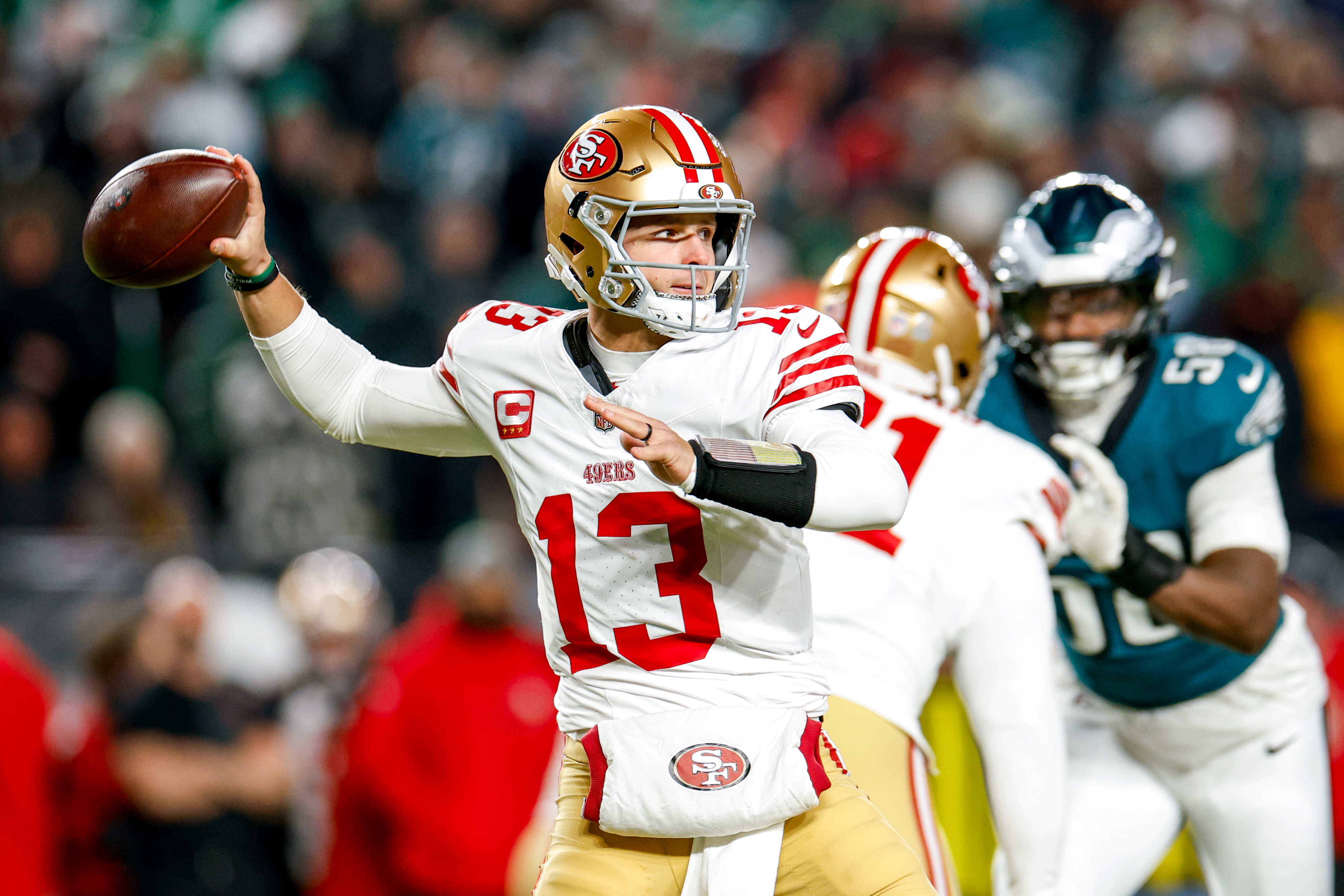 PHILADELPHIA, PENNSYLVANIA - JANUARY 11: Brock Purdy #13 of the San Francisco 49ers throws a pass during the second quarter of the NFC Wild Card playoff game against the Philadelphia Eagles at Lincoln Financial Field on January 11, 2026 in Philadelphia, Pennsylvania. (Photo by Lauren Leigh Bacho/Getty Images)