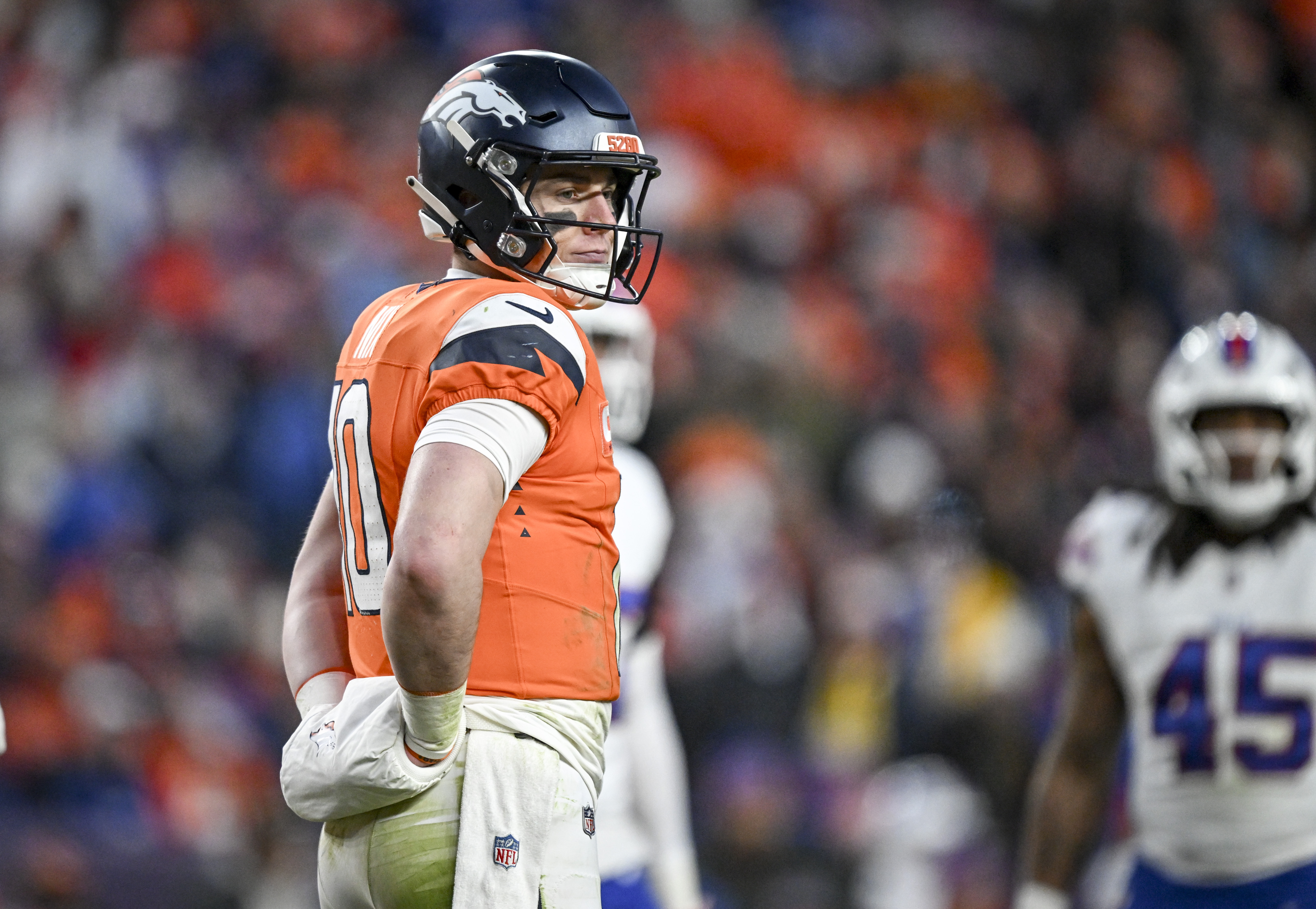Bo Nix of the Denver Broncos suffered a season-ending ankle injury near the end of the team's playoff win over the Bills. (Photo by AAron Ontiveroz/The Denver Post)