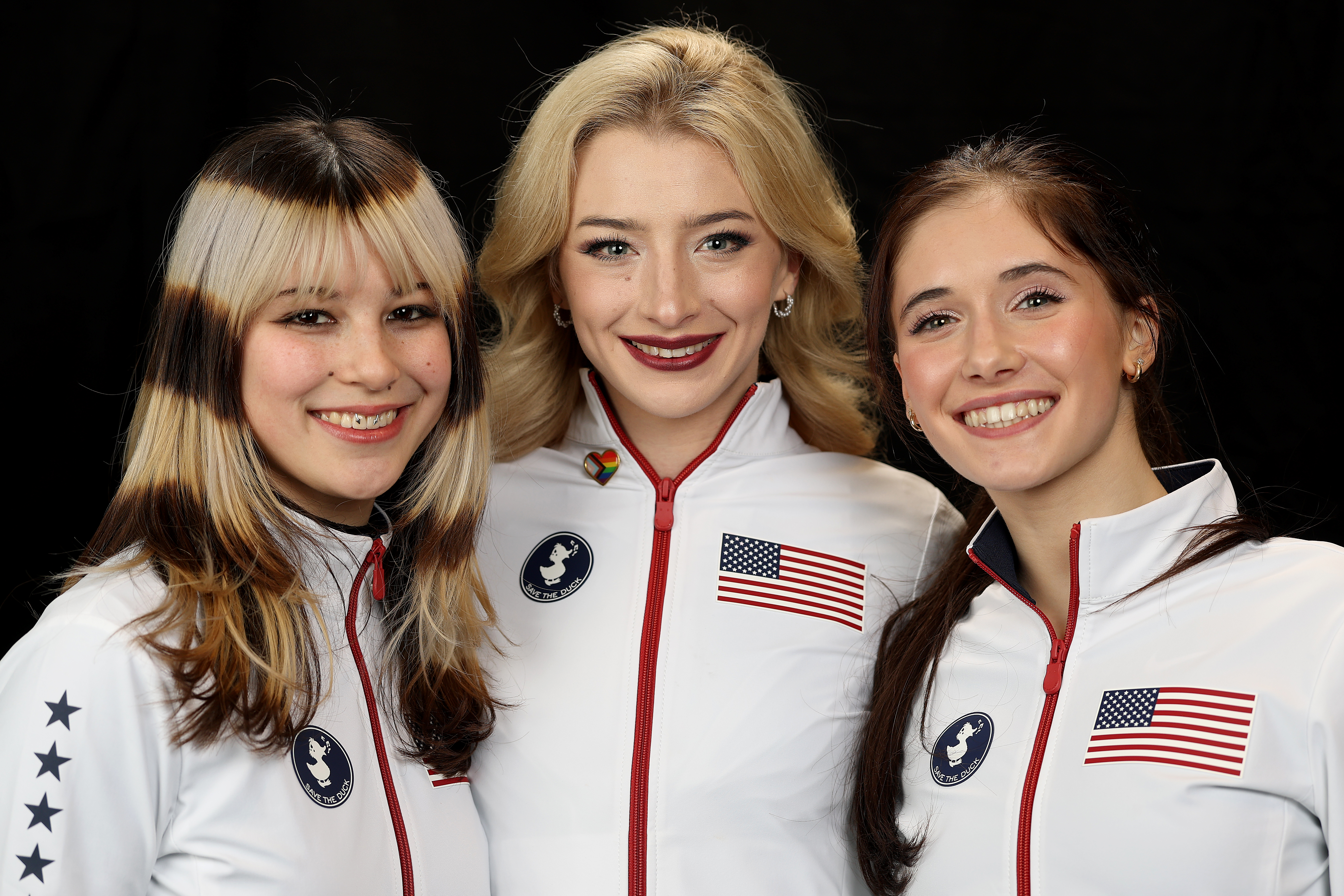 ST LOUIS, MISSOURI - JANUARY 11: Alysa Liu, Amber Glenn, and Isabeau Levito pose for a portrait after making the United States Figure Skating Olympic Team at the Enterprise Center on January 11, 2026 in St Louis, Missouri. (Photo by Matthew Stockman/Getty Images)