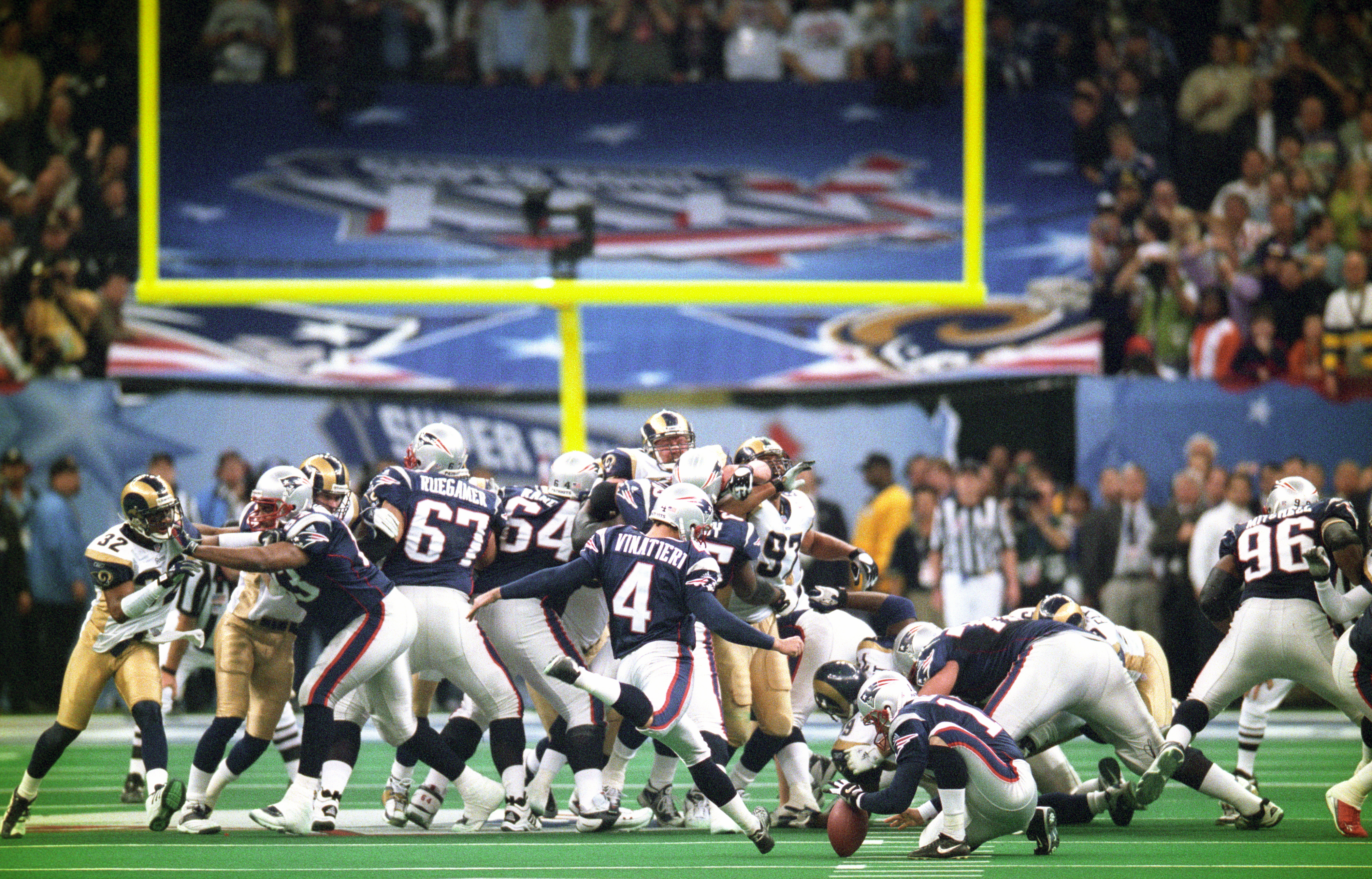 Football: Super Bowl XXXVI: Rear view of New England Patriots Adam Vinatieri (4) in action, kicking game winning 48-yard field goal vs St. Louis Rams during final play of 4th quarter at Louisiana Superdome. Sequence. 
New Orleans, LA 2/3/2002
CREDIT: John Biever (Photo by John Biever /Sports Illustrated via Getty Images)
(Set Number: X65089 TK4 R14 F25 )