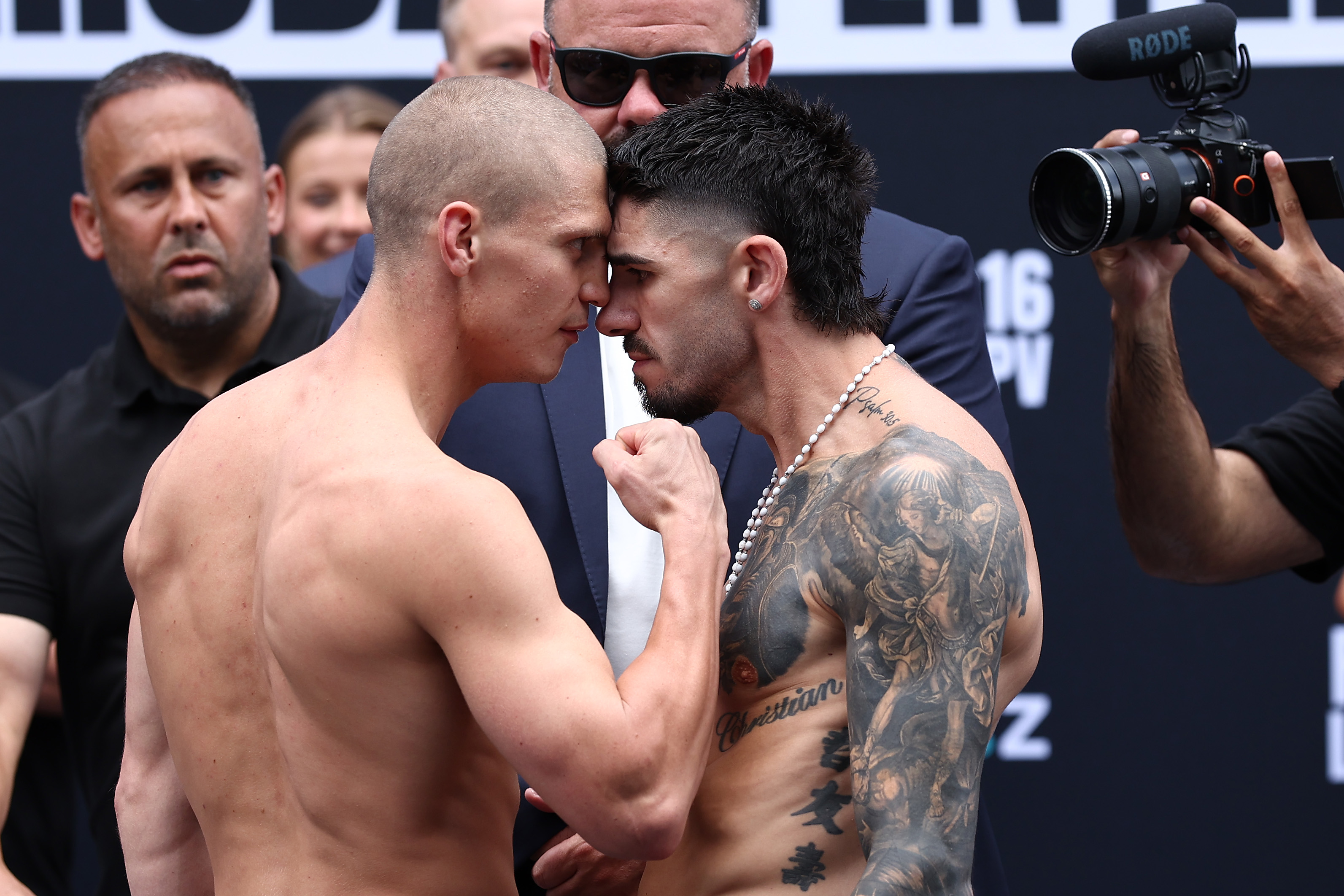 BRISBANE, AUSTRALIA - JANUARY 15: Nikita Tszyu and Michael Zerafa face off during the weigh in at King George Square on January 15, 2026 in Brisbane, Australia. (Photo by Chris Hyde/Getty Images)