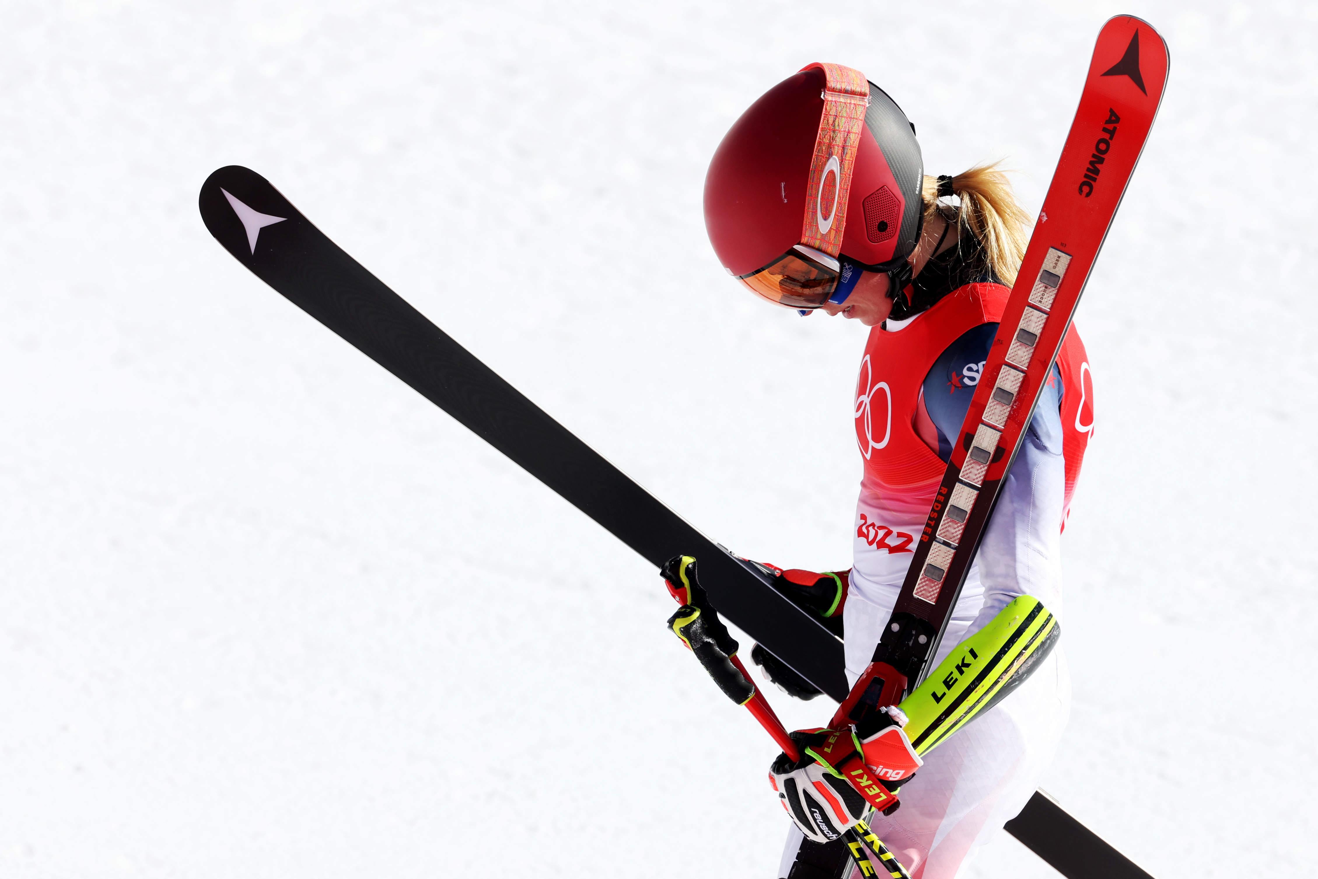 YANQING, CHINA - FEBRUARY 20: Mikaela Shiffrin of Team United States exits the ski area following the Mixed Team Parallel Small Final on day 16 of the Beijing 2022 Winter Olympic Games at National Alpine Ski Centre on February 20, 2022 in Yanqing, China. (Photo by Sean M. Haffey/Getty Images)