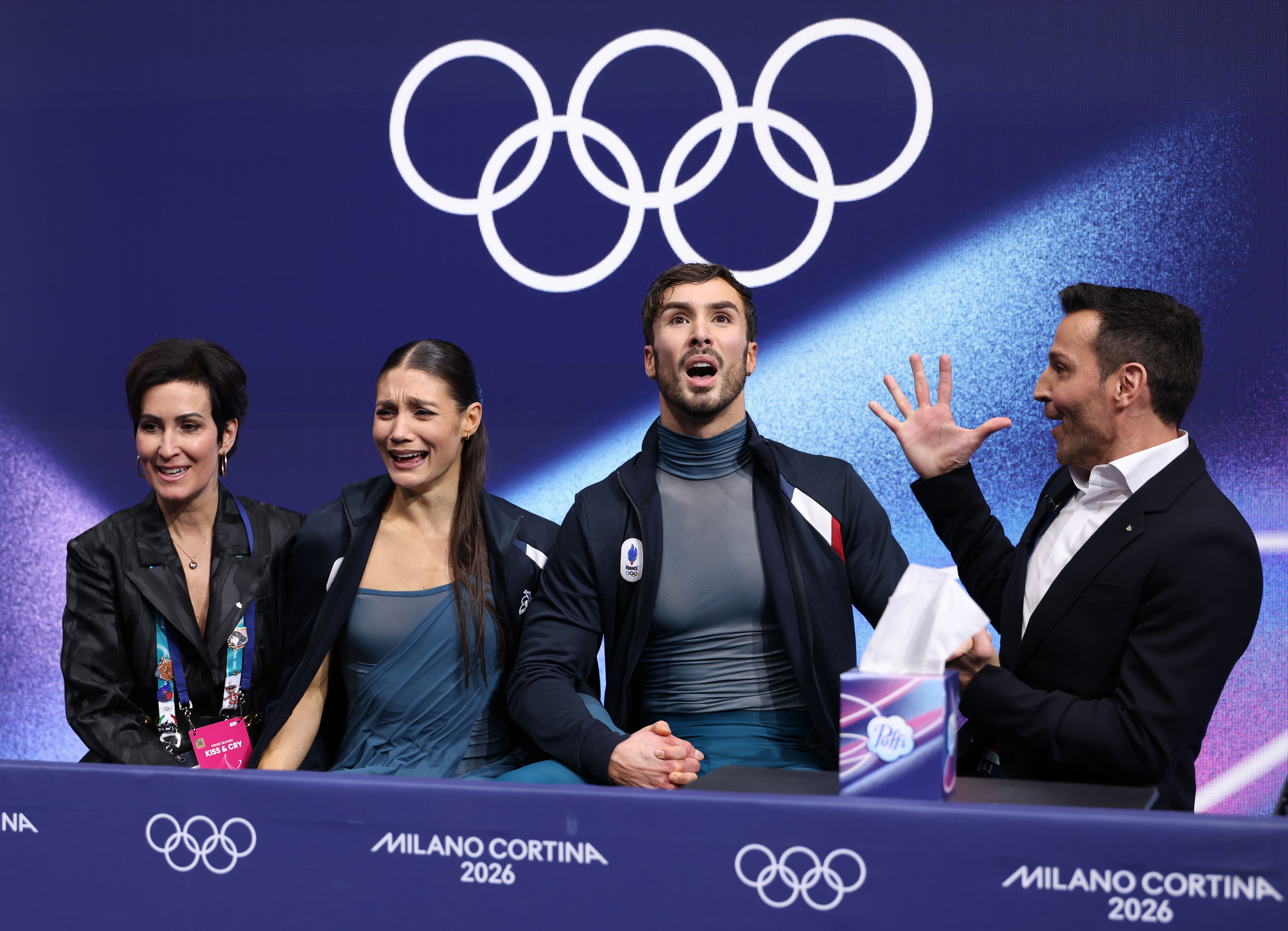 Laurence Fournier Beaudry and Guillaume Cizeron of France react as they wait for the scores during the free dance competition of figure skating ice dance at the Milan-Cortina 2026 Olympic Winter Games in Milan, Italy, Feb. 11, 2026. (Photo by Chen Yichen/Xinhua via Getty Images)