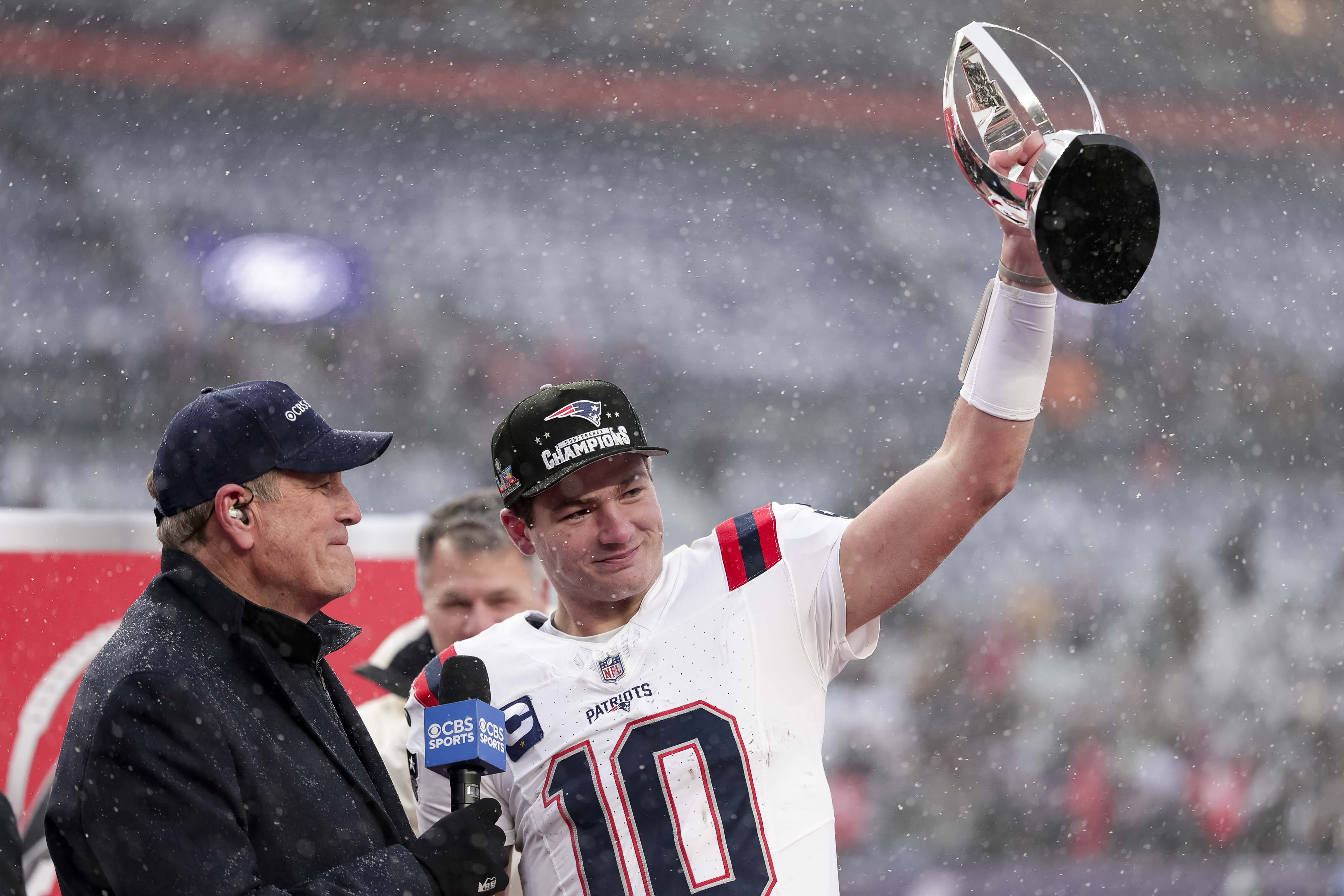 Drake Maye of the New England Patriots celebrates after helping his team to an AFC championship game win over the Broncos. (Photo by Kara Durrette/Getty Images)