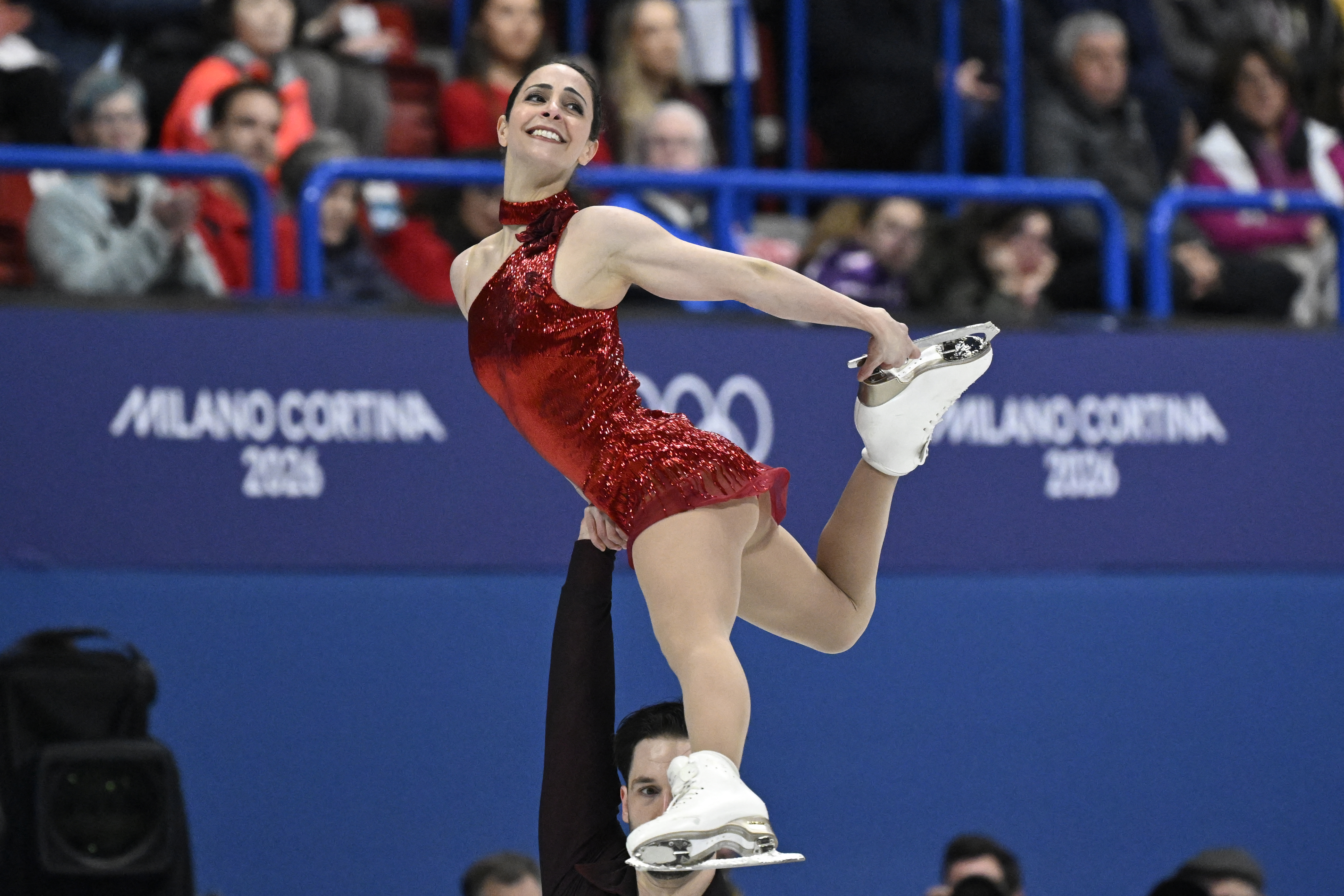 Canada's Maxime Deschamps and Canada's Deanna Stellato-Dudek compete in the figure skating pair skating free skating final during the Milano Cortina 2026 Winter Olympic Games at Milano Ice Skating Arena in Milan on February 16, 2026. (Photo by WANG Zhao / AFP via Getty Images)