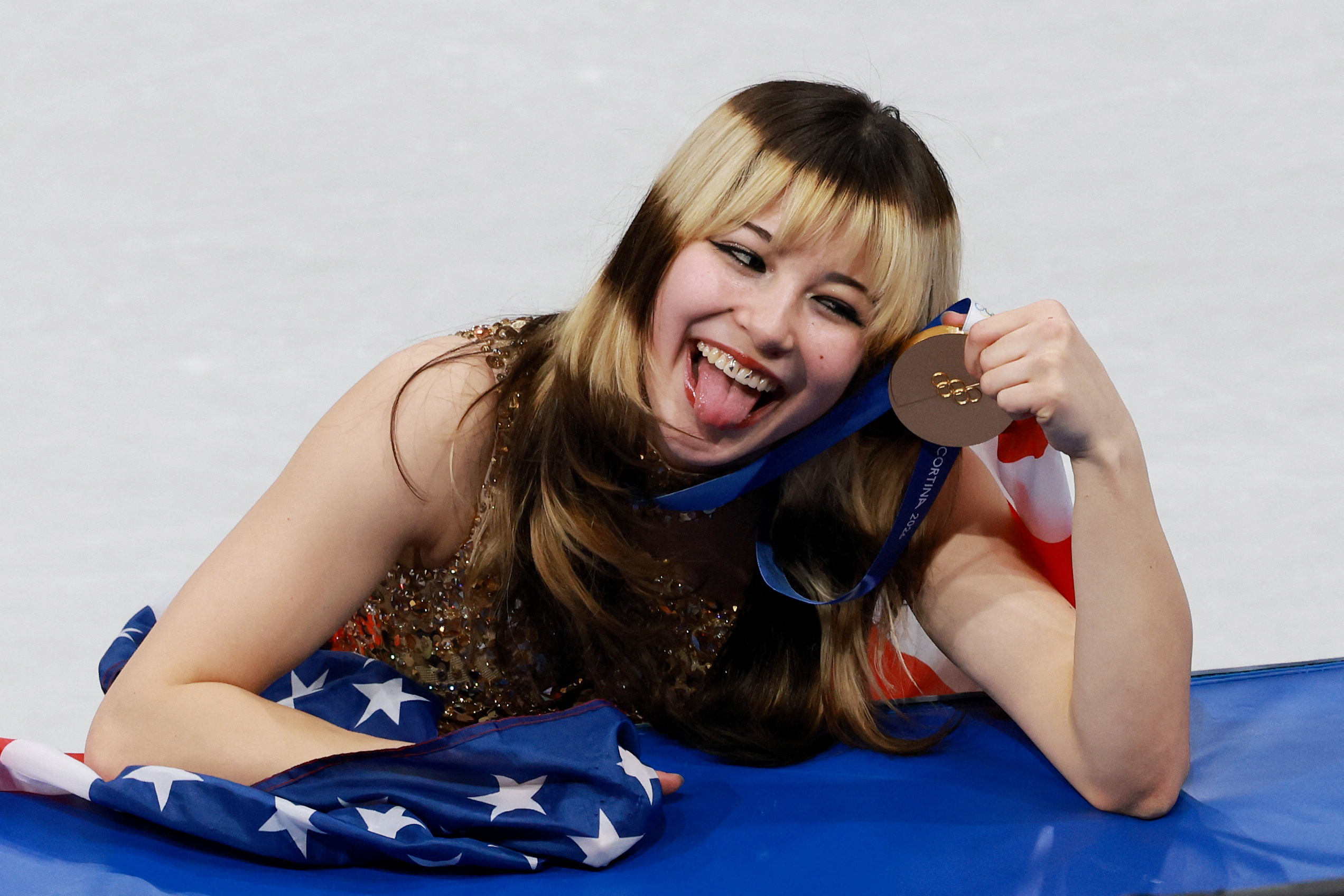 Milano Cortina 2026 Olympics - Figure Skating - Women Single Skating - Victory Ceremony - Milano Ice Skating Arena, Milan, Italy - February 19, 2026. Gold medallist Alysa Liu of United States celebrates after winning the Women Single Skating REUTERS/Fabrizio Bensch