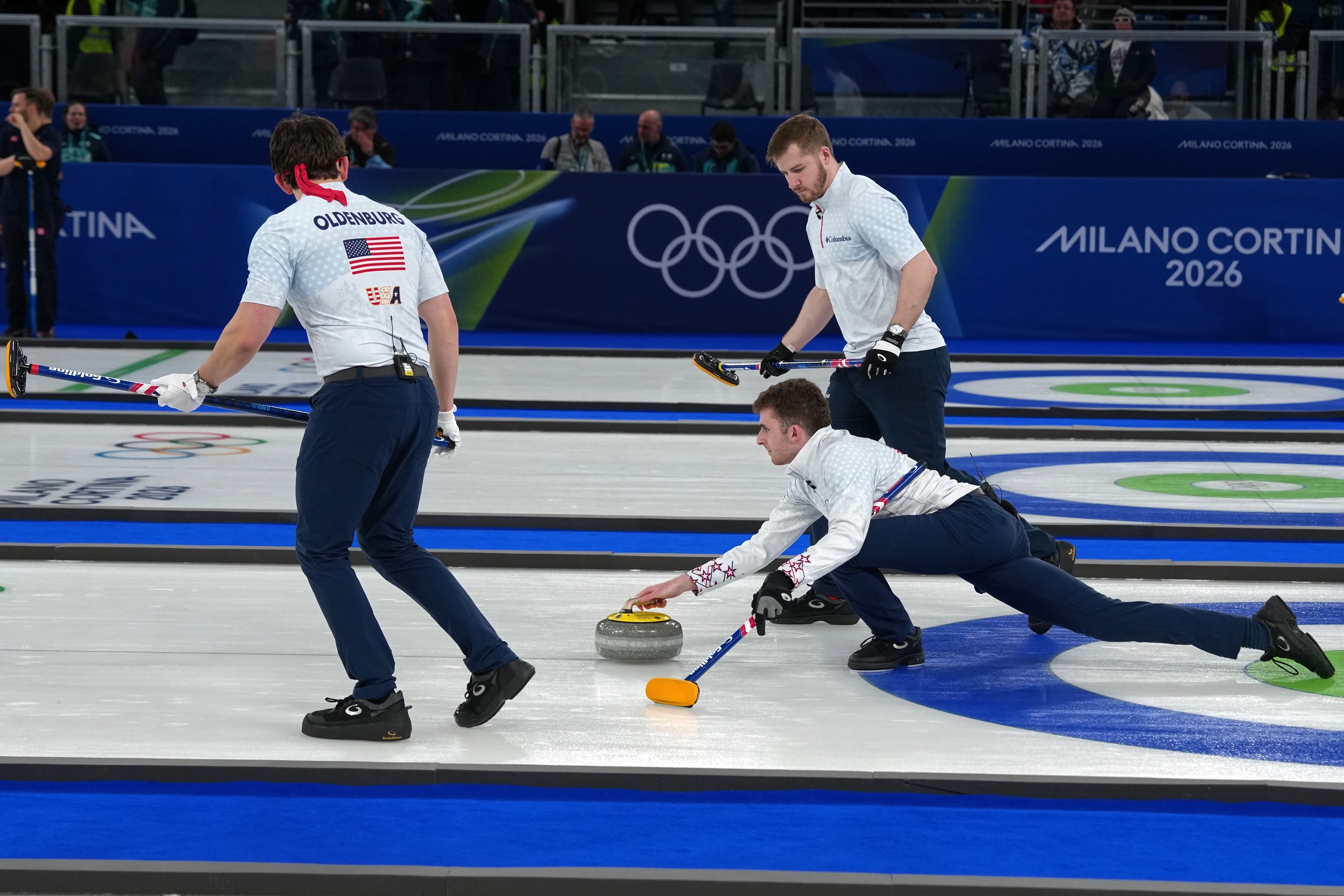 United States' Daniel Casper, center, Ben Richardson, right, and Aidan Oldenburg, in action during the men's curling round robin session against Czechia, at the 2026 Winter Olympics, in Cortina d'Ampezzo, Italy, Wednesday, Feb. 11, 2026. (AP Photo/Misper Apawu)