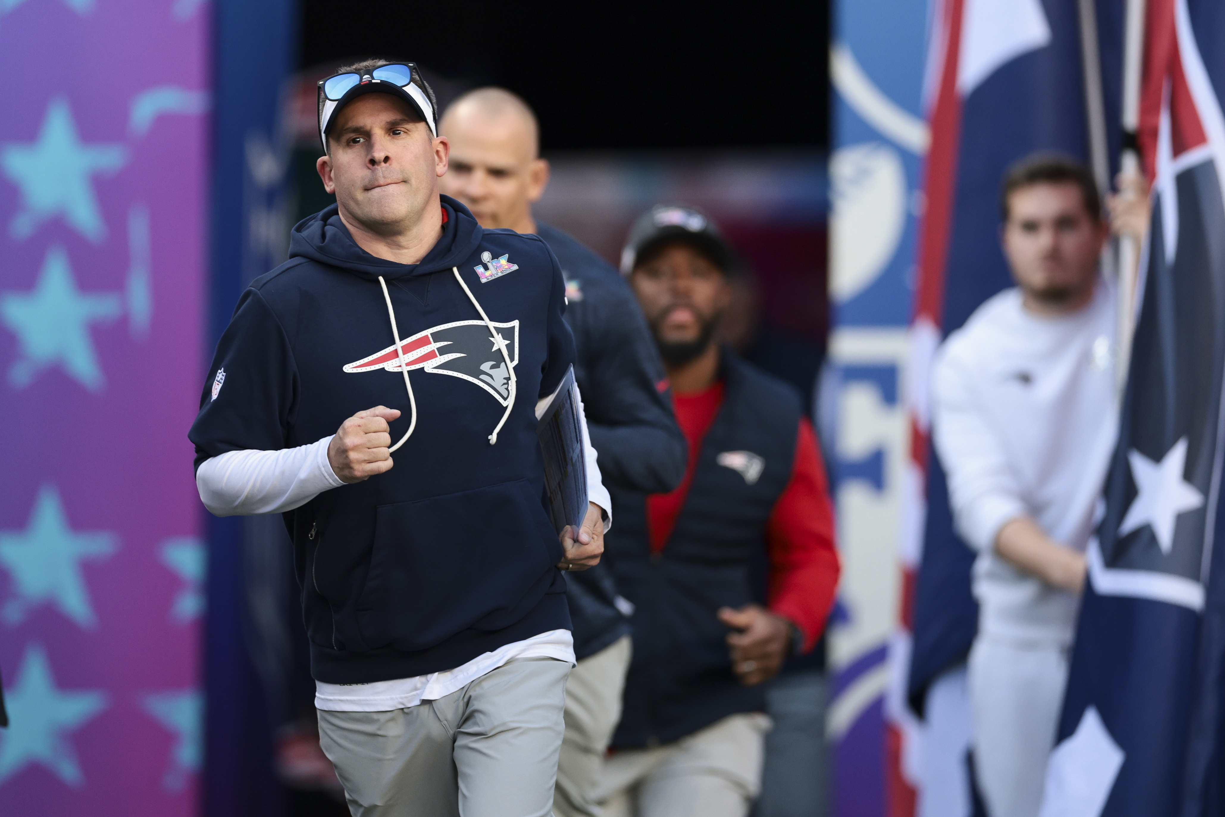 SANTA CLARA, CALIFORNIA - FEBRUARY 08: Josh McDaniels of the New England Patriots runs on the field prior to Super Bowl LX against the Seattle Seahawks at Levi's Stadium on February 08, 2026 in Santa Clara, California. (Photo by Kathryn Riley/Getty Images)