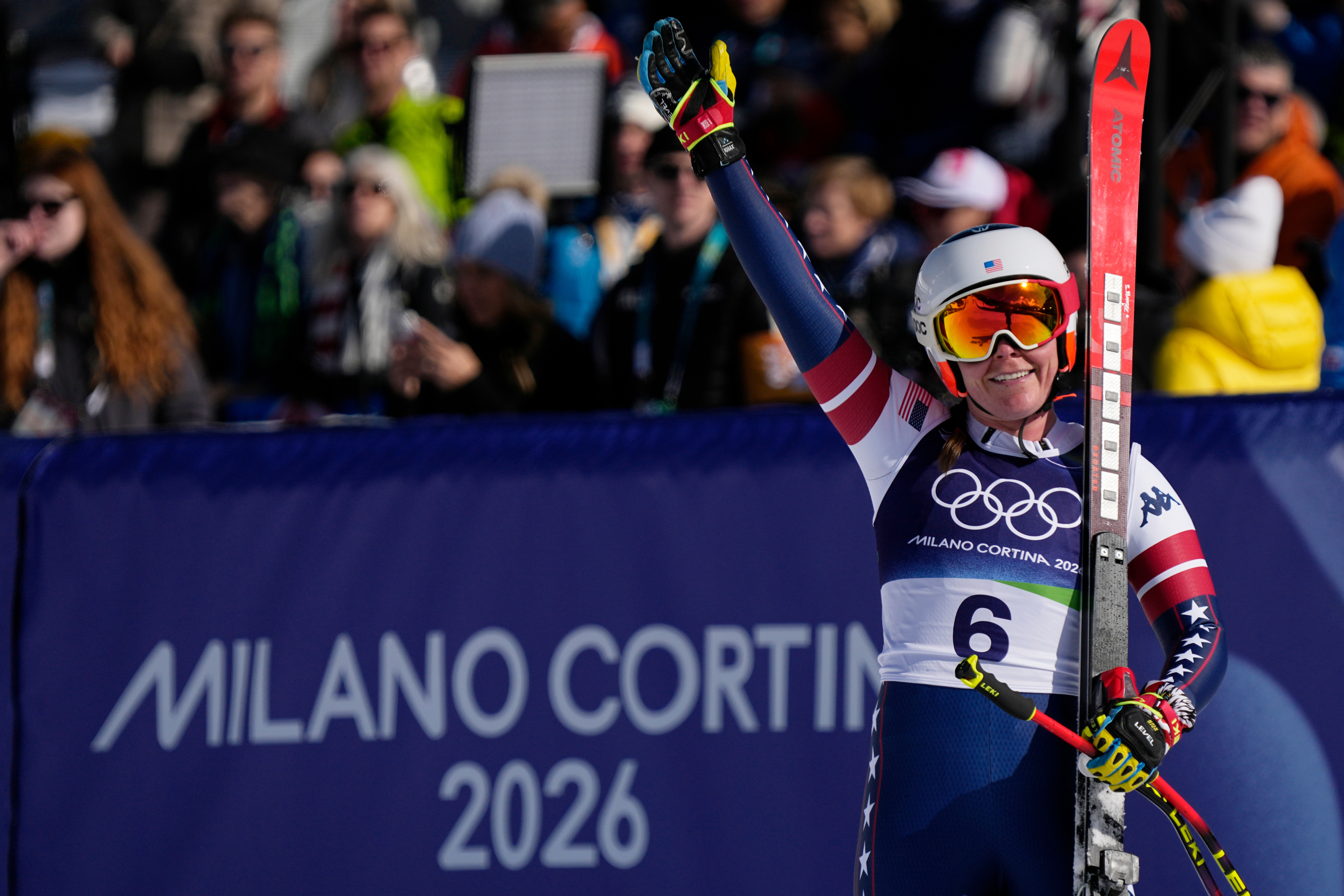 United States' Breezy Johnson celebrates at the finish area of an alpine ski women's downhill race, at the 2026 Winter Olympics, in Cortina d'Ampezzo, Italy, Sunday, Feb. 8, 2026. (AP Photo/Andy Wong)