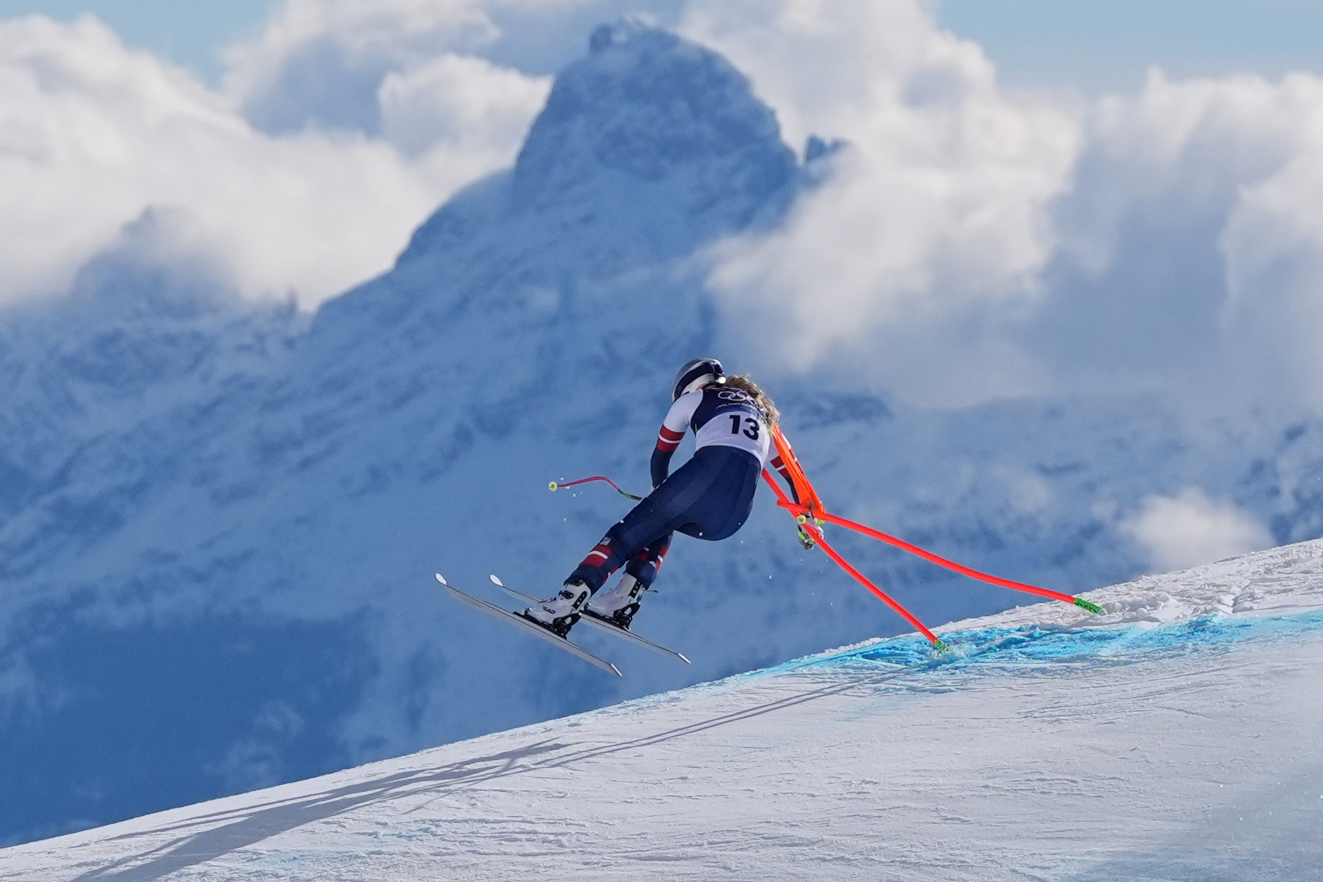 United States' Lindsey Vonn crashes into a gate during an alpine ski women's downhill race, at the 2026 Winter Olympics, in Cortina d'Ampezzo, Italy, Sunday, Feb. 8, 2026. (AP Photo/Jacquelyn Martin)