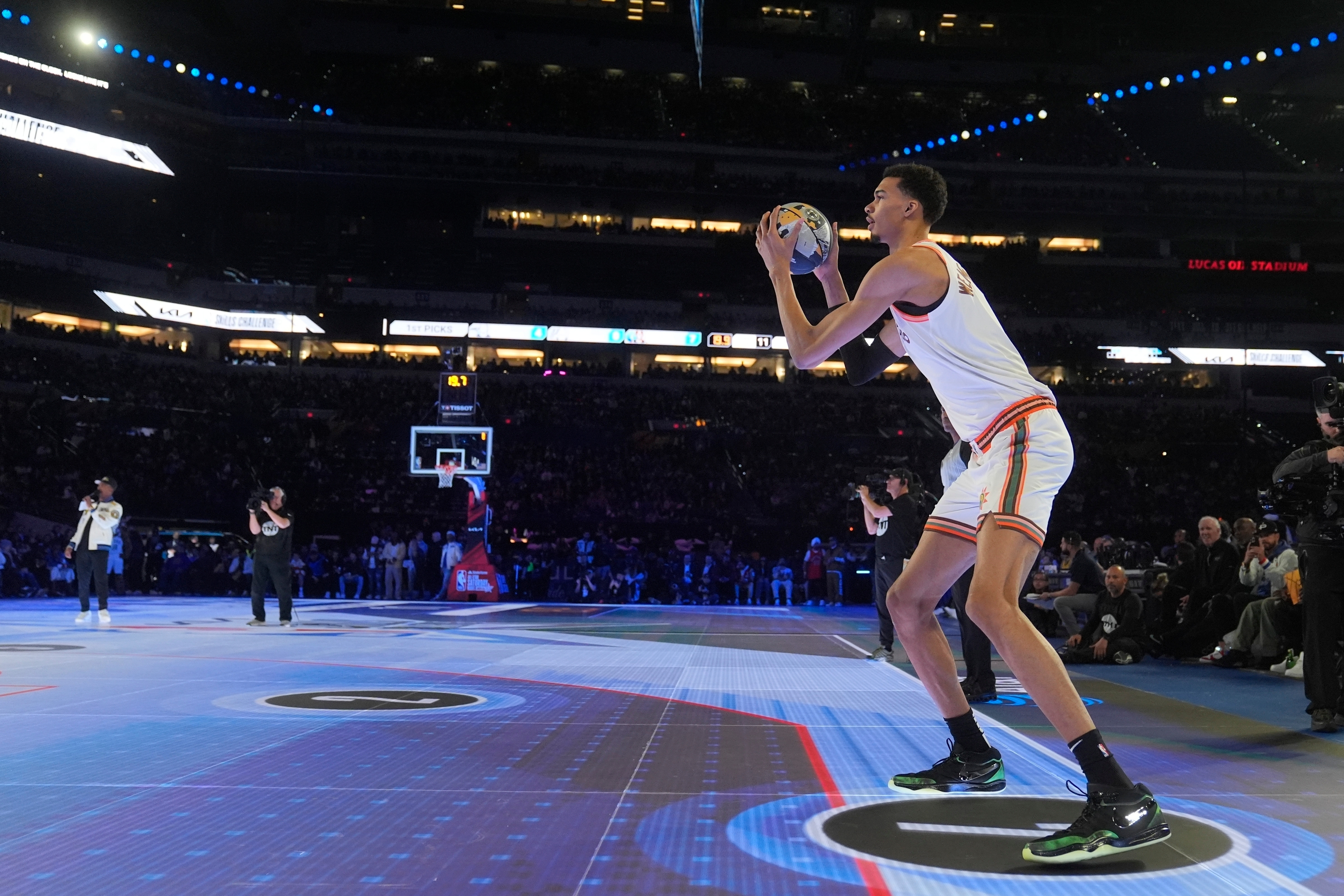 FILE - San Antonio Spurs' Victor Wembanyama shoots during the skills challenge at the NBA basketball All-Star weekend, Feb. 17, 2024, in Indianapolis. (AP Photo/Darron Cummings, File)