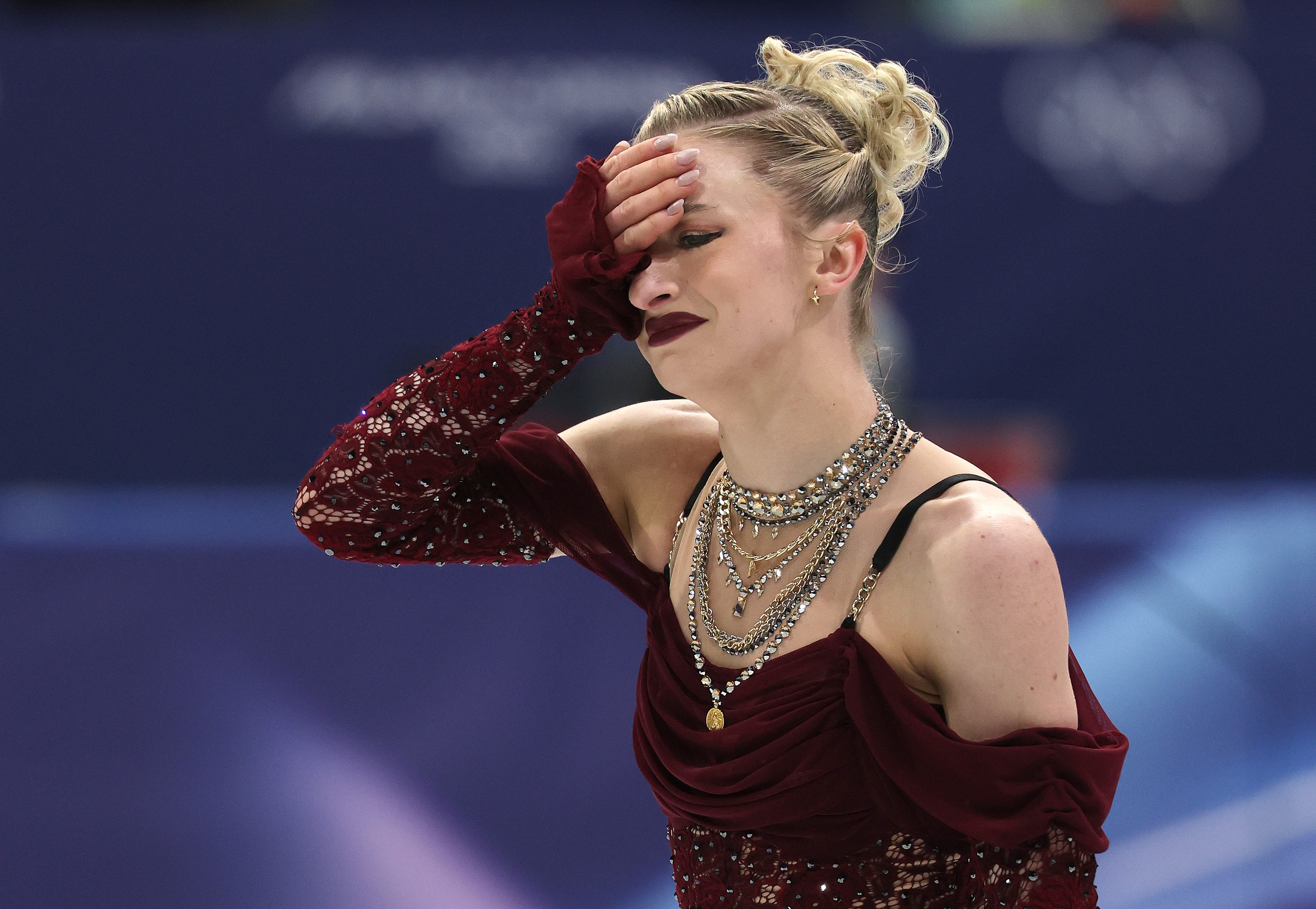 MILAN ITALY  FEBRUARY 17, 2026  Amber Glenn gets emotional after failing to complete an element competes during the women's short program figure skating at the 2026 Winter Olympics, in Milan, Italy, Tuesday, Feb. 17, 2026. (Robert Gauthier / Los Angeles Times via Getty Images)