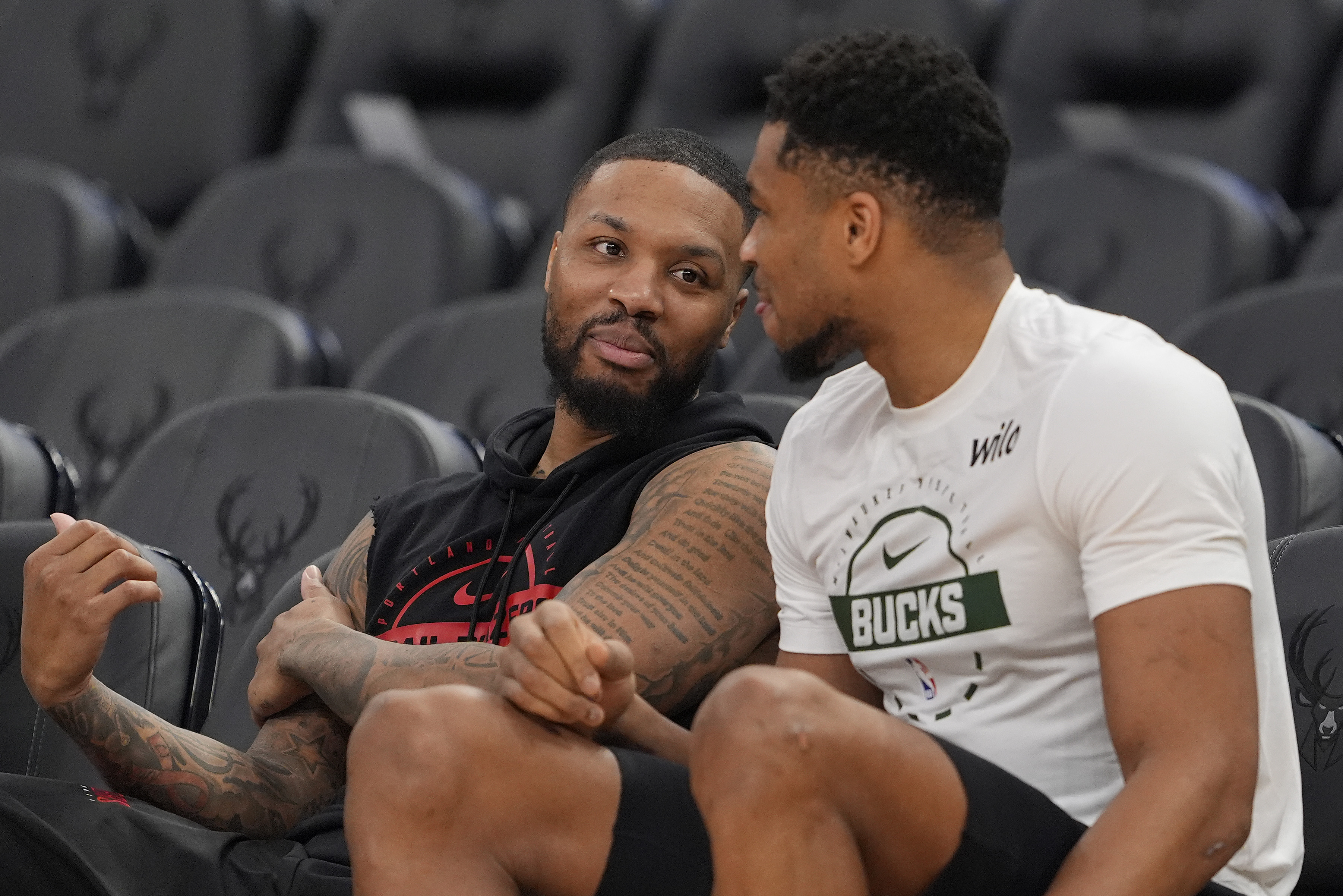 MILWAUKEE, WISCONSIN - NOVEMBER 24: (L-R) Damian Lillard #0 of the Portland Trail Blazers and Giannis Antetokounmpo #34 of the Milwaukee Bucks talk before the game at Fiserv Forum on November 24, 2025 in Milwaukee, Wisconsin. NOTE TO USER: User expressly acknowledges and agrees that, by downloading and or using this photograph, User is consenting to the terms and conditions of the Getty Images License Agreement. (Photo by Patrick McDermott/Getty Images)
