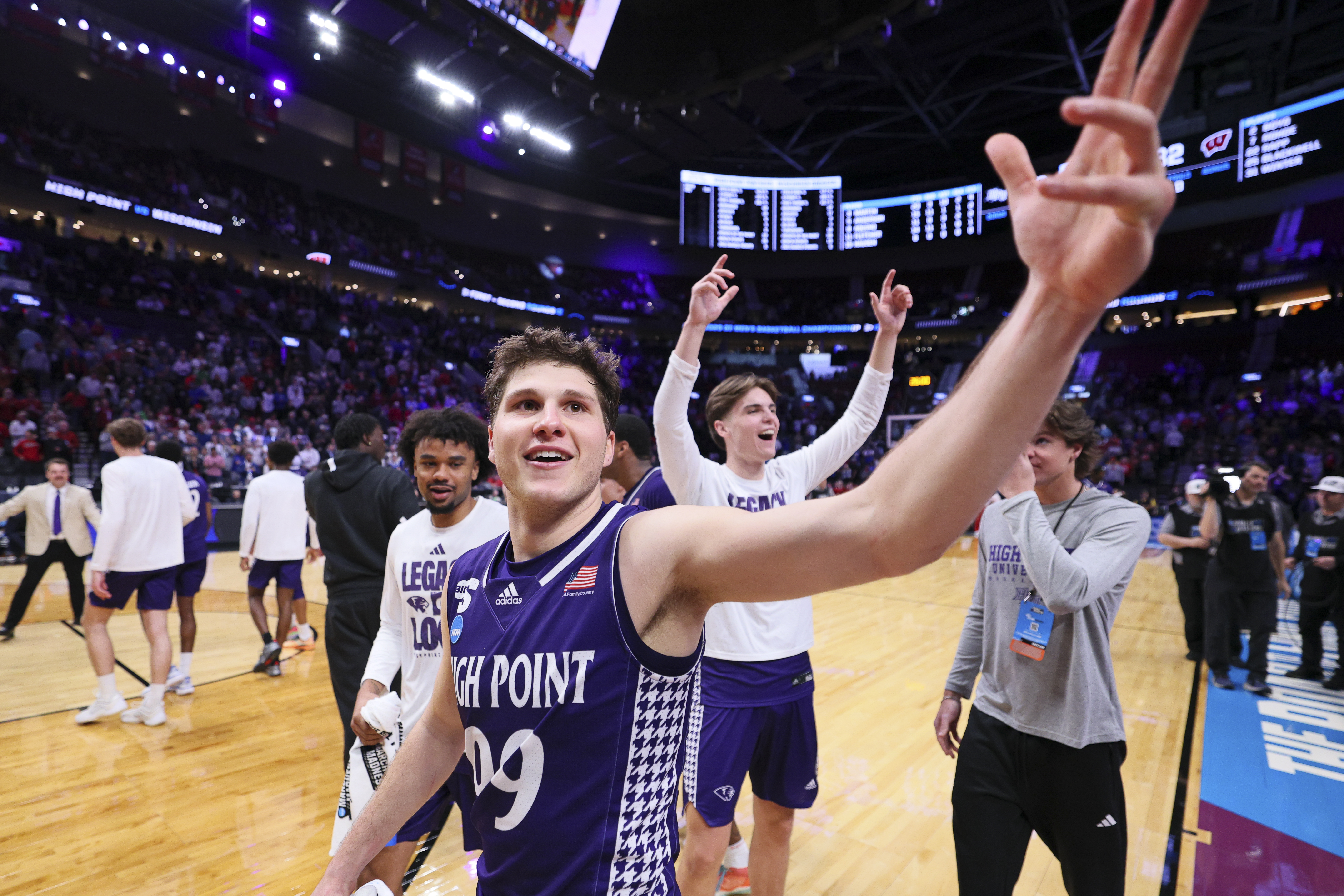 PORTLAND, OREGON - MARCH 19: Guard Chase Johnston #99 of the High Point Panthers waves to the crowd after the High Point Panthers upset the Wisconsin Badgers in the first round of the 2026 NCAA Men's Basketball Tournament held at Moda Center on March 19, 2026 in Portland, Oregon. (Photo by C. Morgan Engel/NCAA Photos via Getty Images)