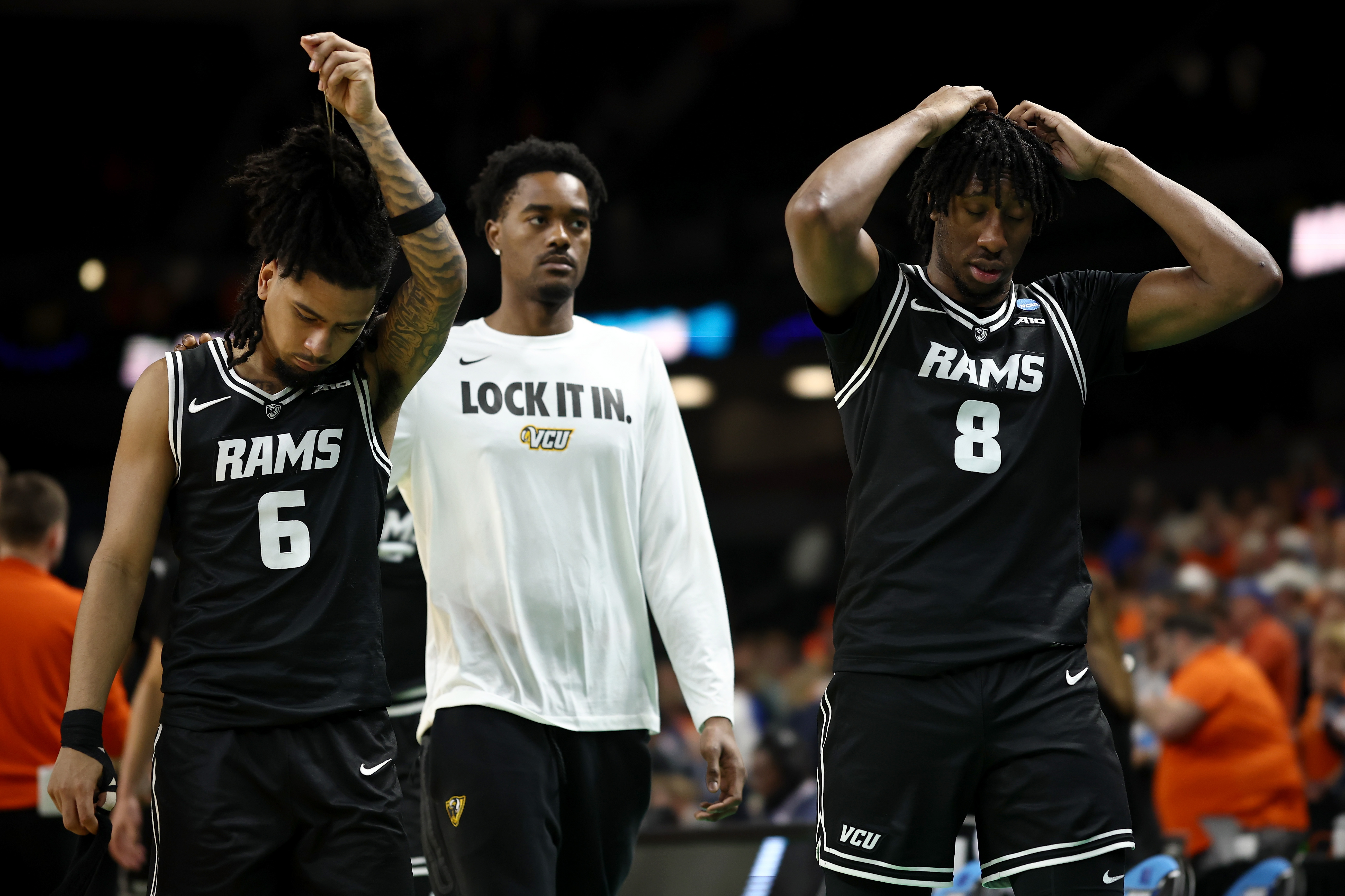 GREENVILLE, SOUTH CAROLINA - MARCH 21: Terrence Hill Jr. #6 and Michael Belle #8 of the VCU Rams walk off the court after the game against the Illinois Fighting Illini in the second round of the 2026 NCAA Men's Basketball Tournament at Bon Secours Wellness Arena on March 21, 2026 in Greenville, South Carolina. The Fighting Illini defeated the Rams 76-55. (Photo by Jared C. Tilton/Getty Images)