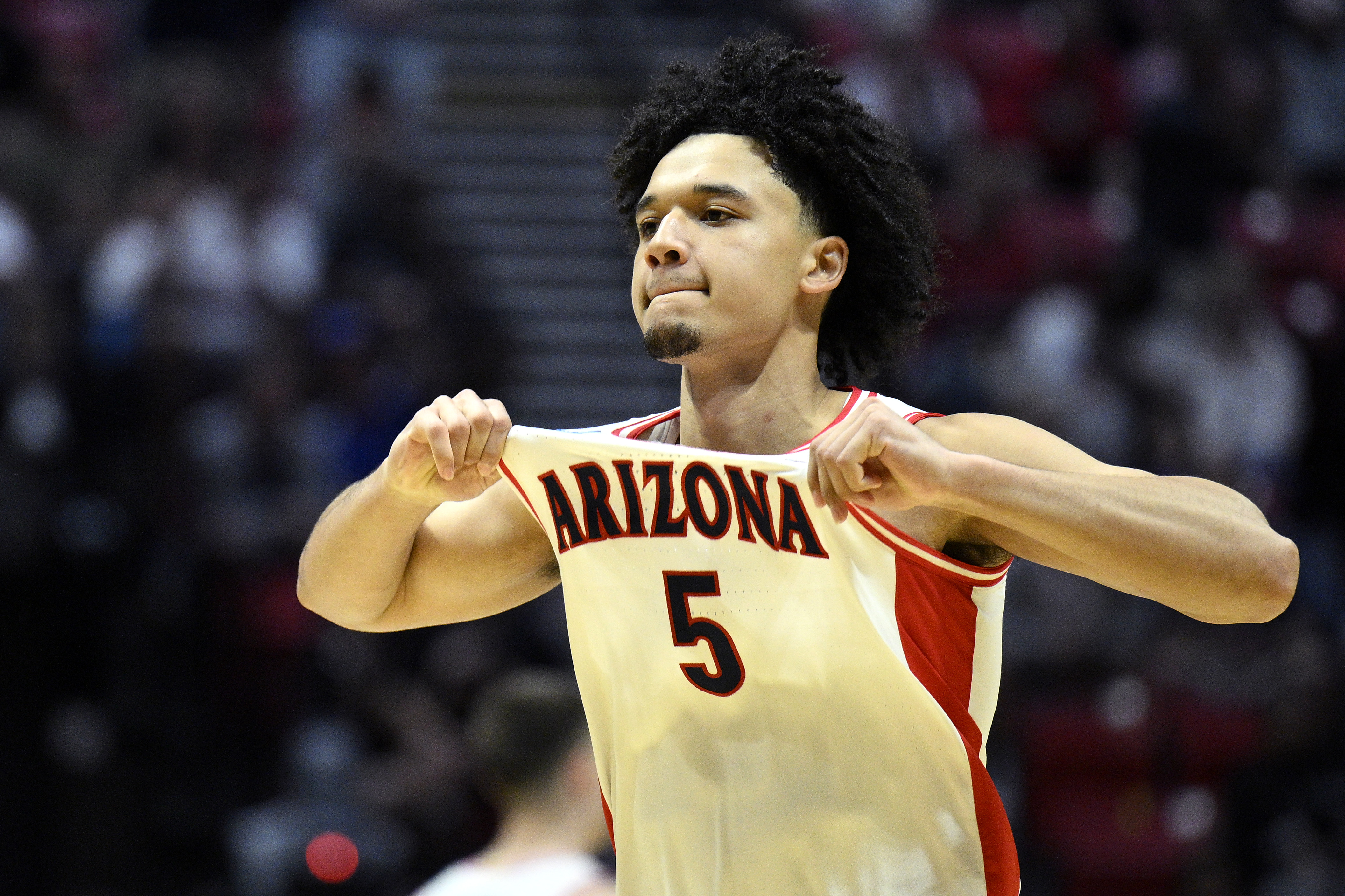 SAN DIEGO, CALIFORNIA - MARCH 22: Brayden Burries #5 of the Arizona Wildcats celebrates during the second half against the Utah State Aggies in the second round of the 2026 NCAA Men's Basketball Tournament at Viejas Arena at San Diego State University on March 22, 2026 in San Diego, California. (Photo by Orlando Ramirez/Getty Images)