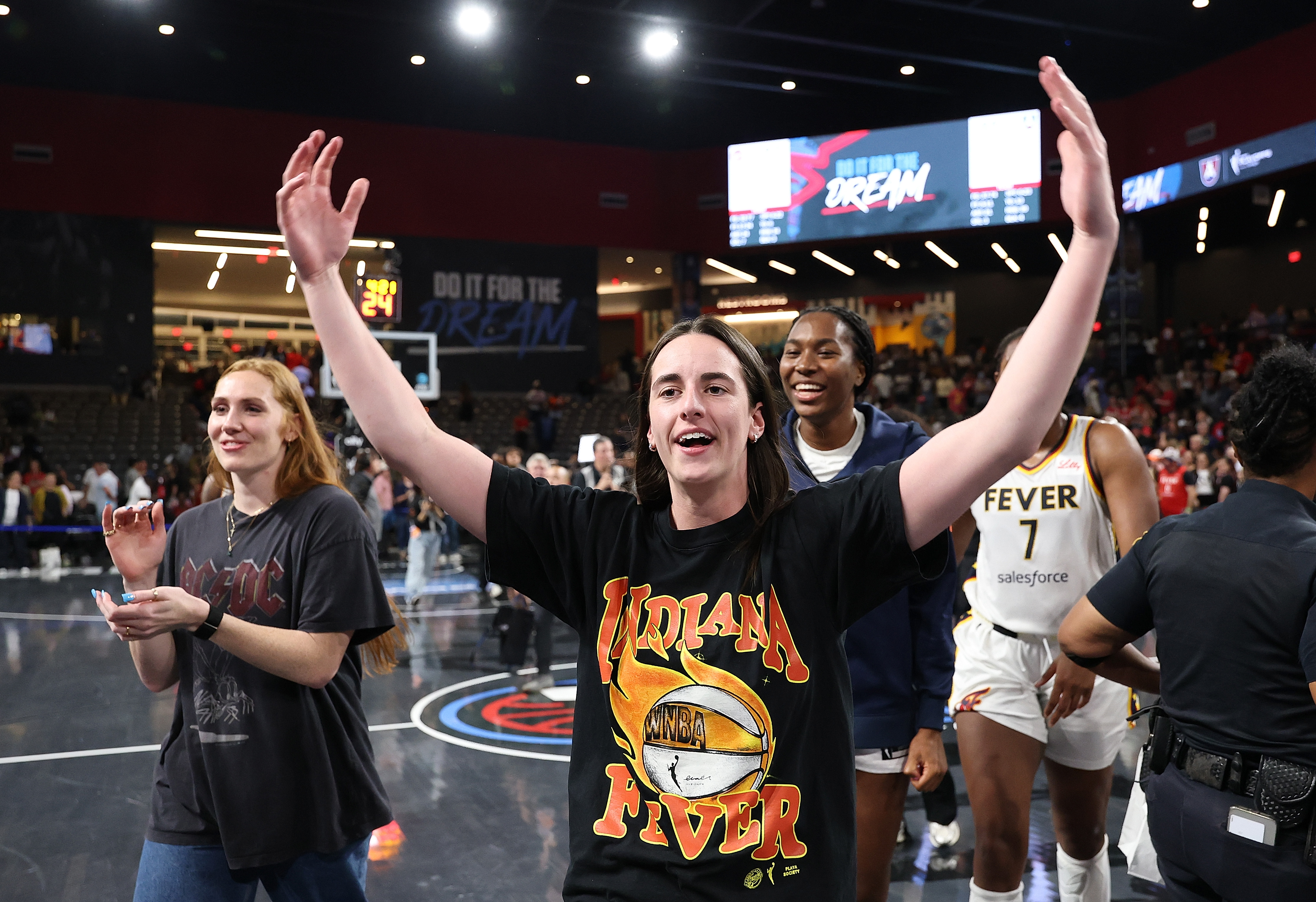 COLLEGE PARK, GEORGIA - SEPTEMBER 18:  Caitlin Clark #22 of the Indiana Fever celebrates their 87-85 win in game three of the first round of WNBA Playoffs between the Indiana Fever and Atlanta Dream at Gateway Center Arena on September 18, 2025 in College Park, Georgia.  NOTE TO USER: User expressly acknowledges and agrees that, by downloading and or using this photograph, User is consenting to the terms and conditions of the Getty Images License Agreement.  (Photo by Kevin C. Cox/Getty Images)