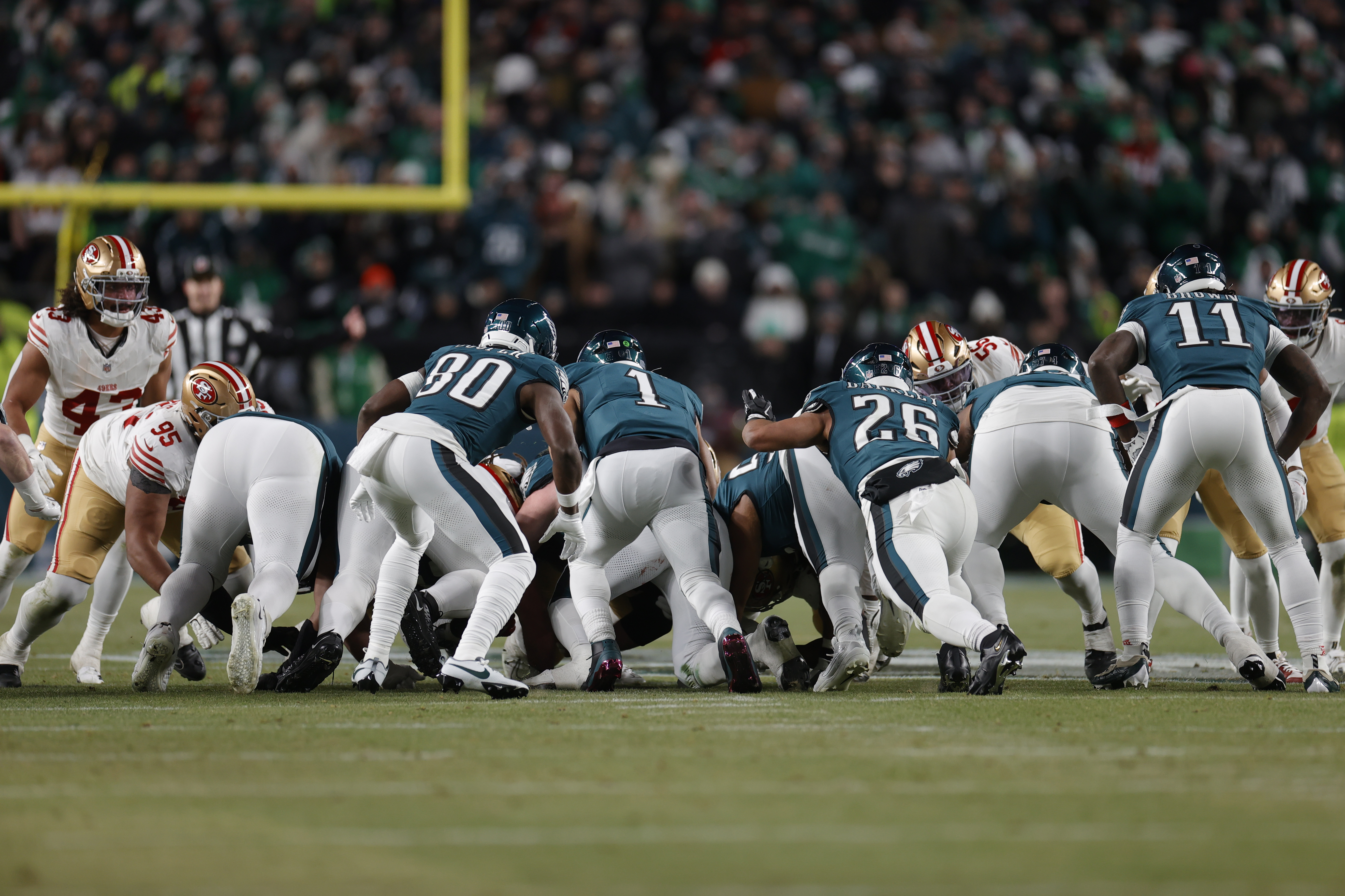 PHILADELPHIA, PA - JANUARY 11: Jalen Hurts #1 of the Philadelphia Eagles rushes on a tush push during the NFC Wild Card playoff game against the San Francisco 49ers at Lincoln Financial Field on January 11, 2026 in Philadelphia, Pennsylvania. The 49ers defeated the Eagles 23-19. (Photo by Michael Zagaris/San Francisco 49ers/Getty Images)