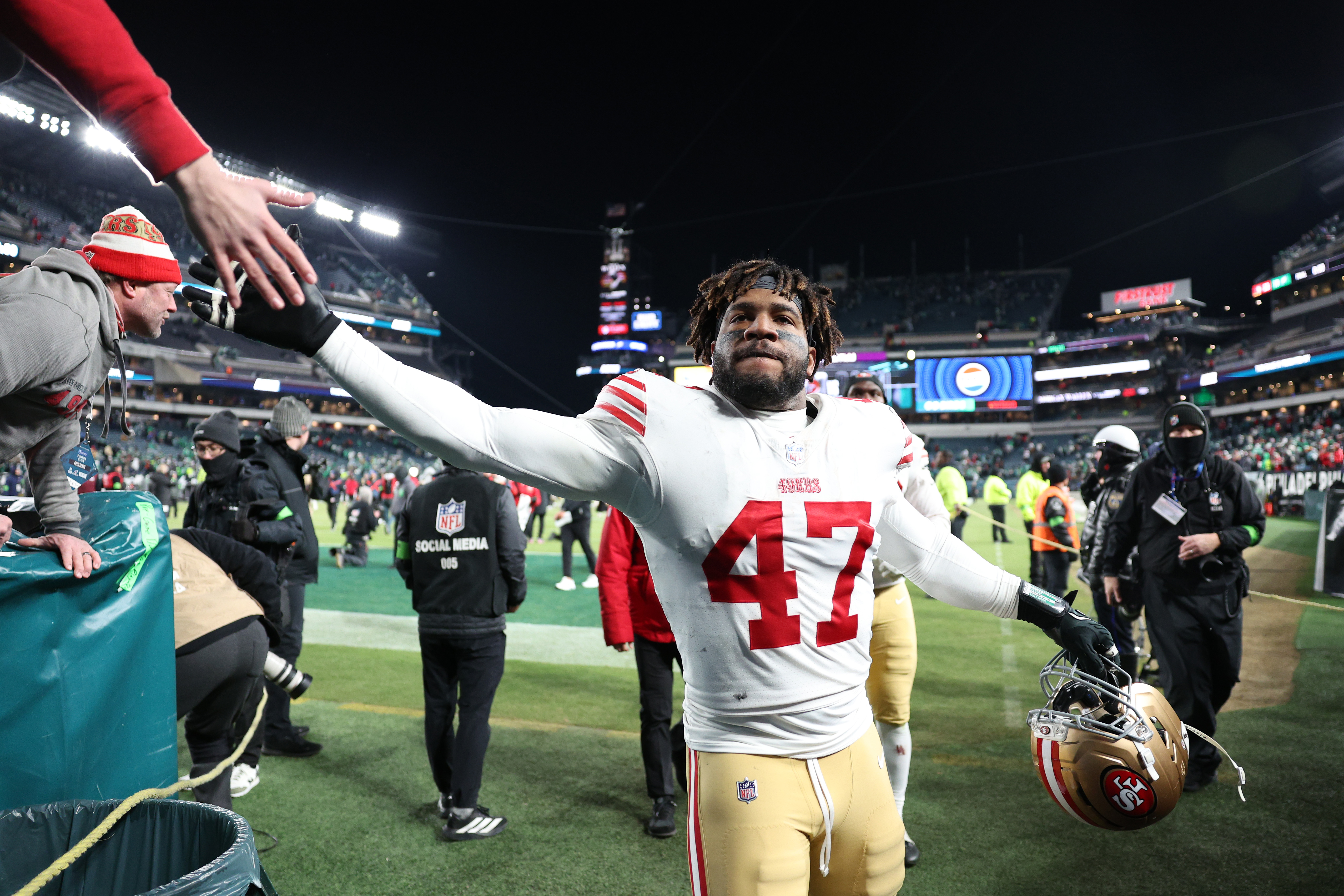 PHILADELPHIA, PENNSYLVANIA - JANUARY 11: Bryce Huff #47 of the San Francisco 49ers celebrates with fans after defeating the Philadelphia Eagles in the NFC Wild Card Playoff game at Lincoln Financial Field on January 11, 2026 in Philadelphia, Pennsylvania. (Photo by Elsa/Getty Images)