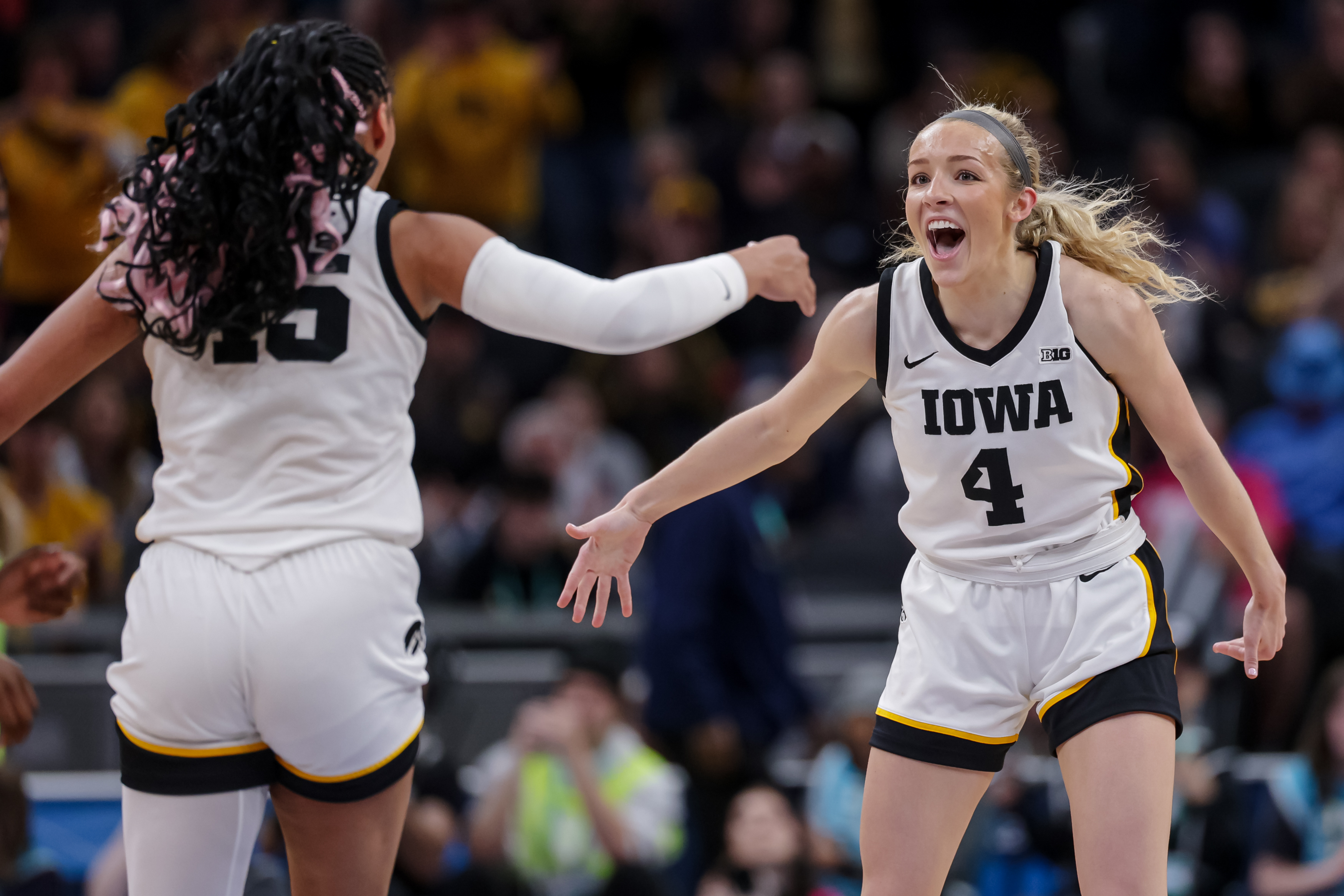 INDIANAPOLIS, INDIANA - MARCH 6: Kylie Feuerbach #4 of the Iowa Hawkeyes reacts during the game against the Illinois Fighting Illini in the quarterfinals of the Big Ten Women's Basketball Tournament at Gainbridge Fieldhouse on March 6, 2026 in Indianapolis, Indiana.  (Photo by Michael Hickey/Getty Images)