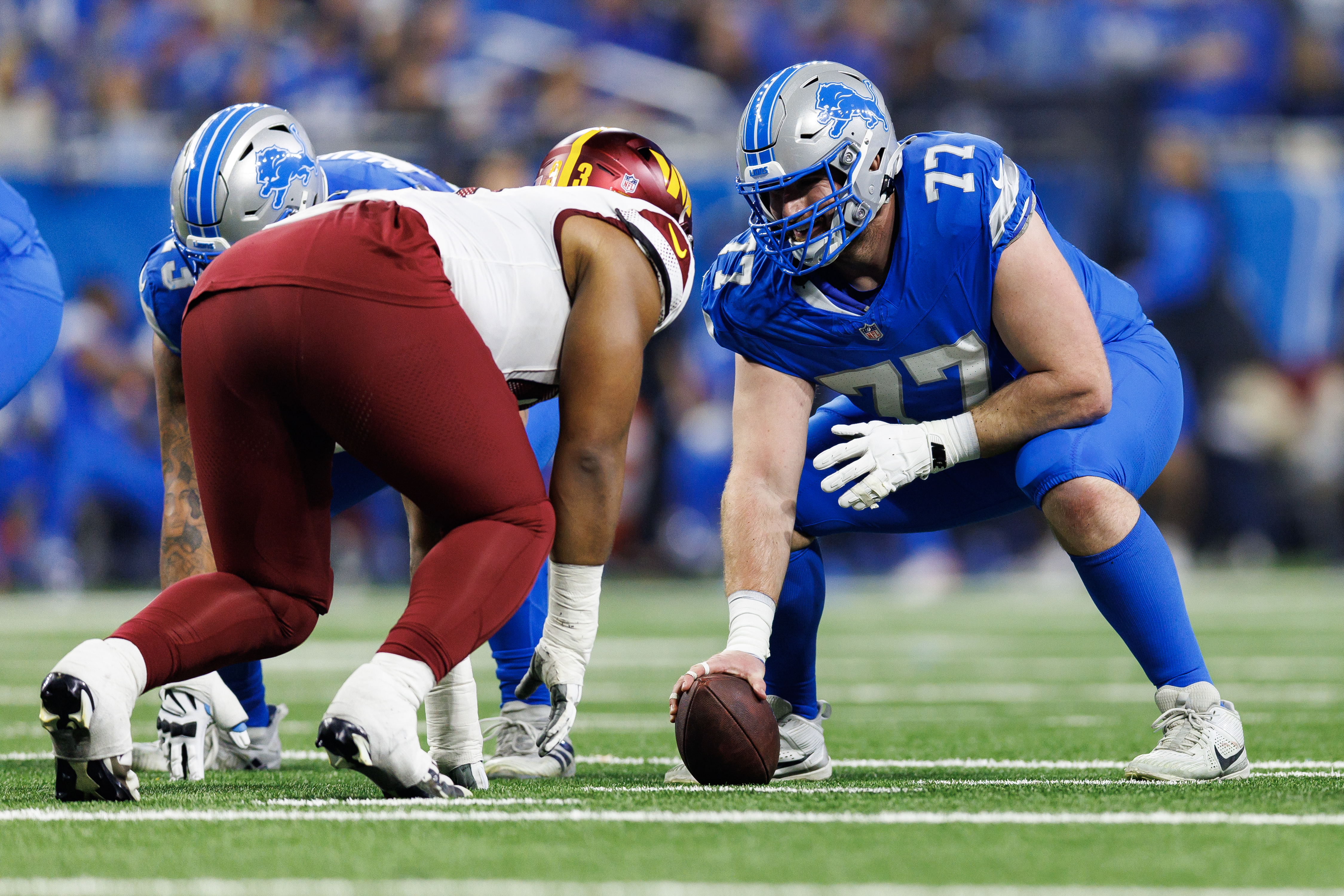  Center Frank Ragnow #77 of the Detroit Lions gets set during the first half of the NFC Divisional Playoff game against the Washington Commanders, at Ford Field on January 18, 2025 in Detroit, Michigan. (Photo by Brooke Sutton/Getty Images)