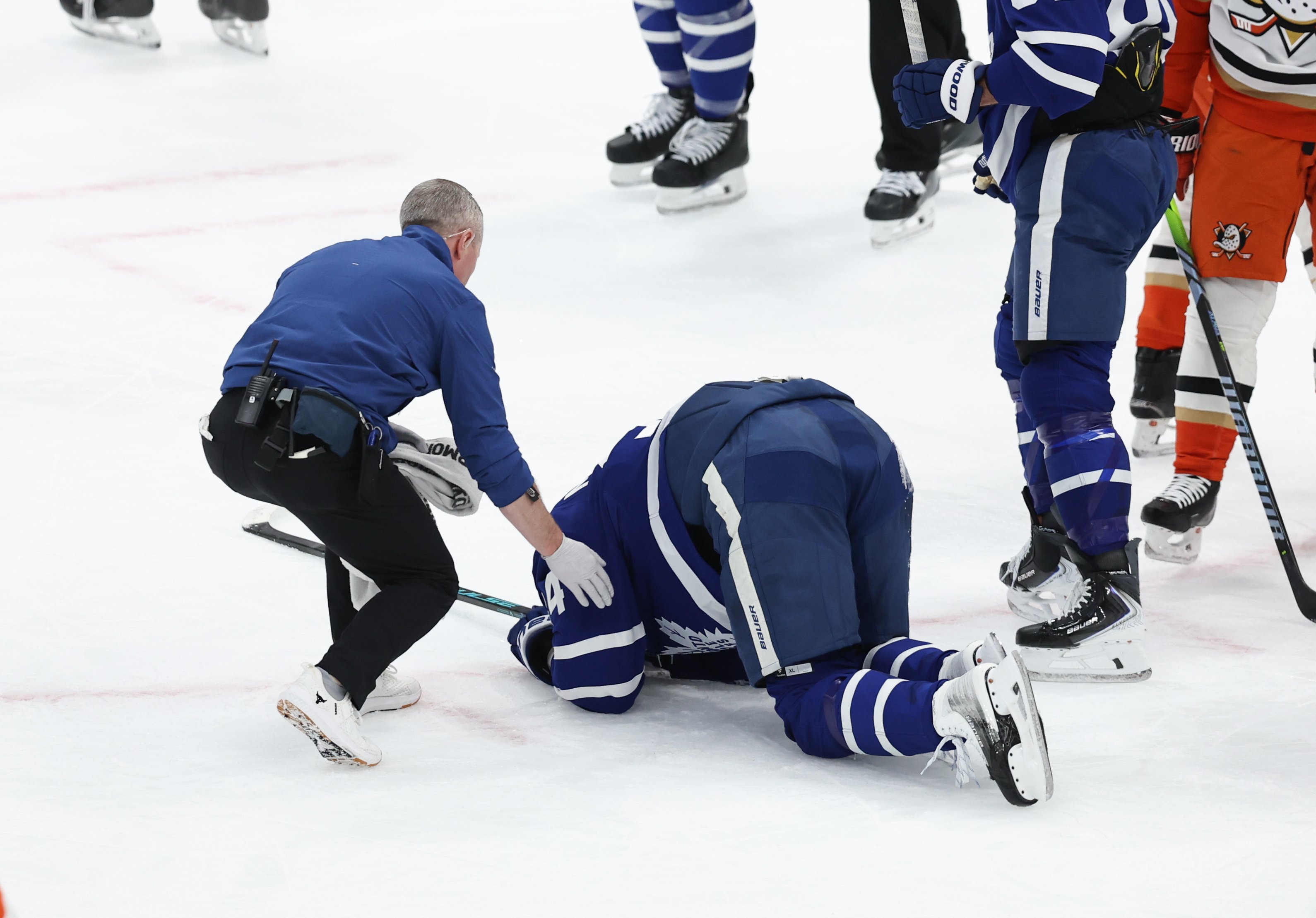 TORONTO, ON - March 12  In second period action, Auston Matthews (34) of the Toronto Maple Leafs is helped off the ice after a collision with Radko Gudas (7) of the Anaheim DucksThe Toronto Maple Leafs took on the Anaheim Ducks in NHL hockey action at the Scotiabank Arena.March 12 2026 Richard Lautens/Toronto Star        (Richard Lautens/Toronto Star via Getty Images)