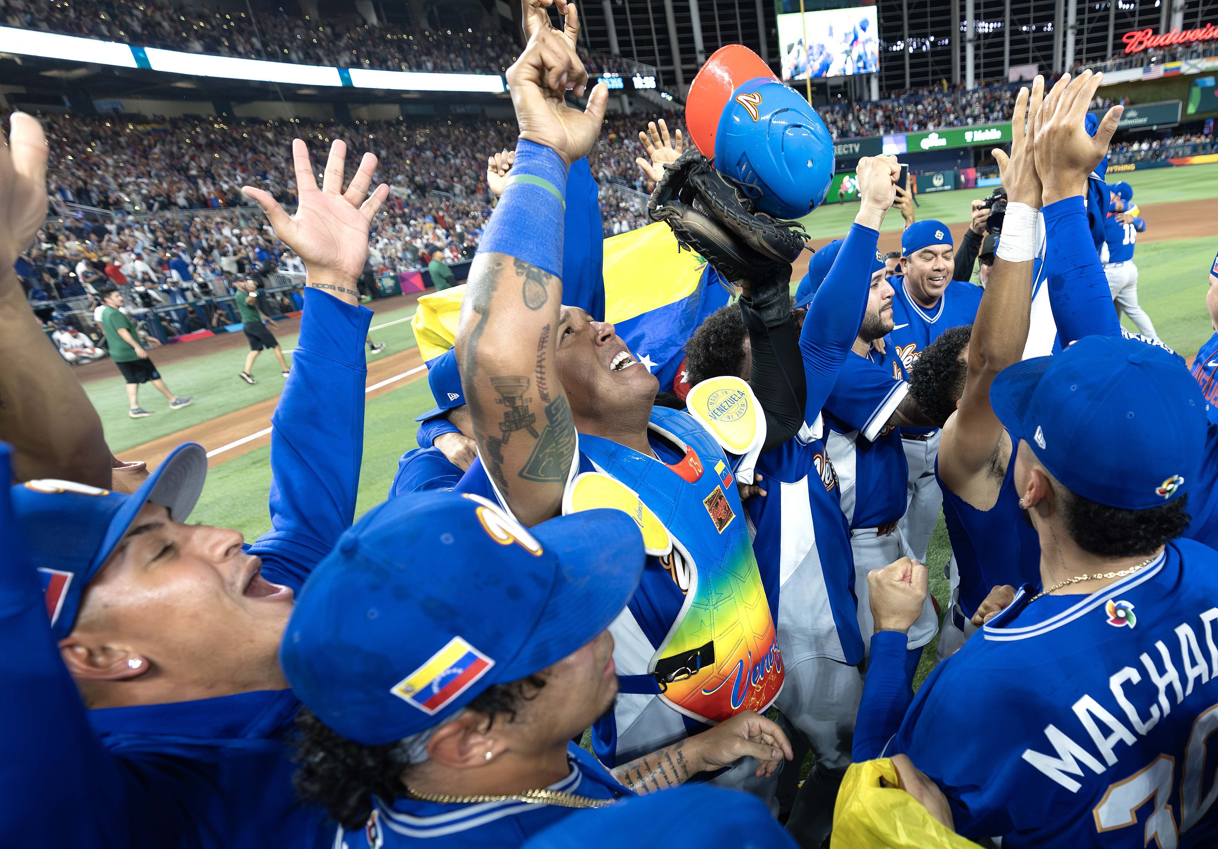 MIAMI, FLORIDA - MARCH 17: Members of Team Venezuela celebrate after the 3-2 victory against Team United States at loanDepot park on March 17, 2026 in Miami, Florida. (Photo by Al Bello/Getty Images)