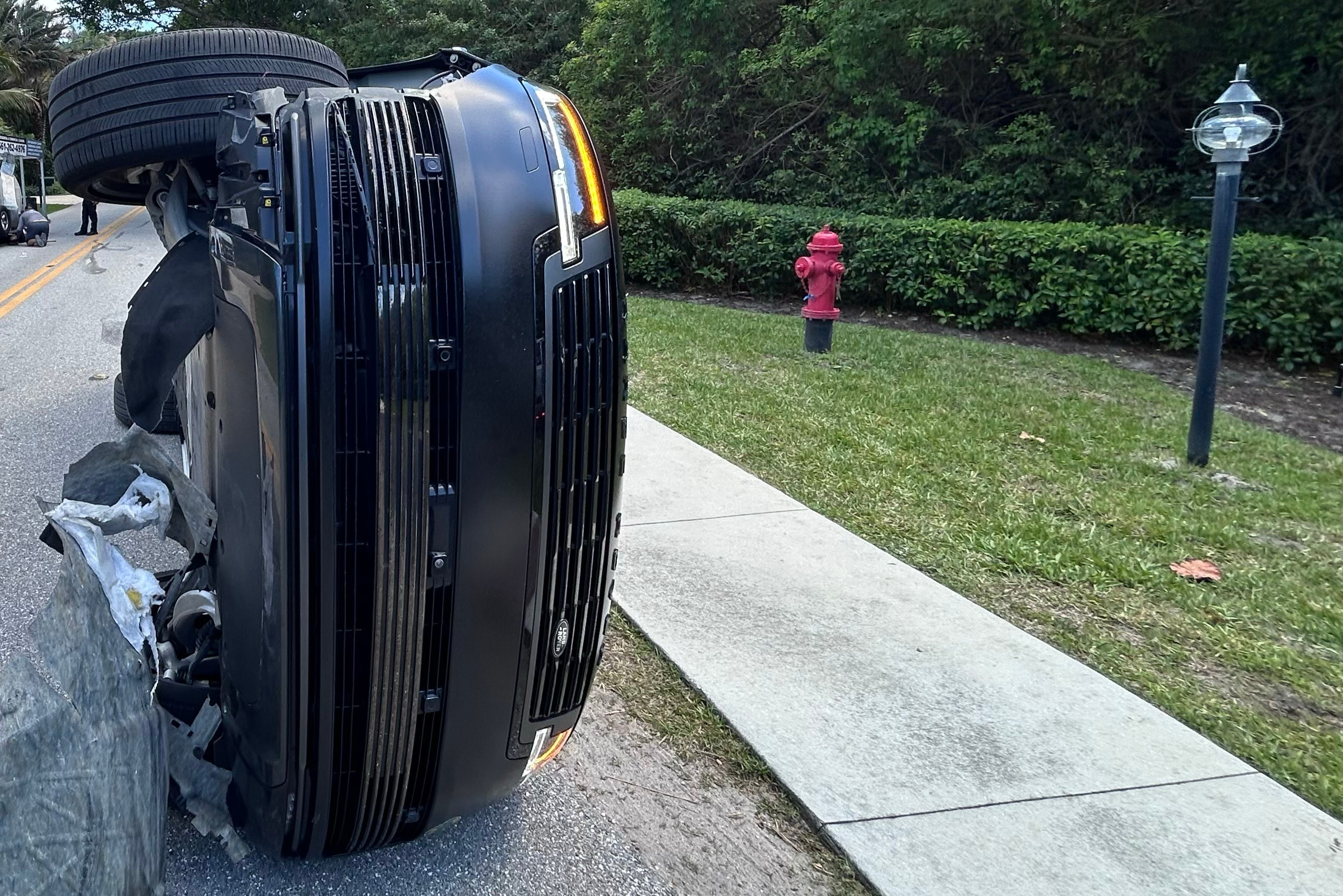 This photo provided by the Martin County Sheriff's Office shows the overturned vehicle in a rollover crash which involved Tiger Woods in Jupiter Island, Fla., on Friday, March 27, 2026. (Martin County Sheriff's Office via AP)