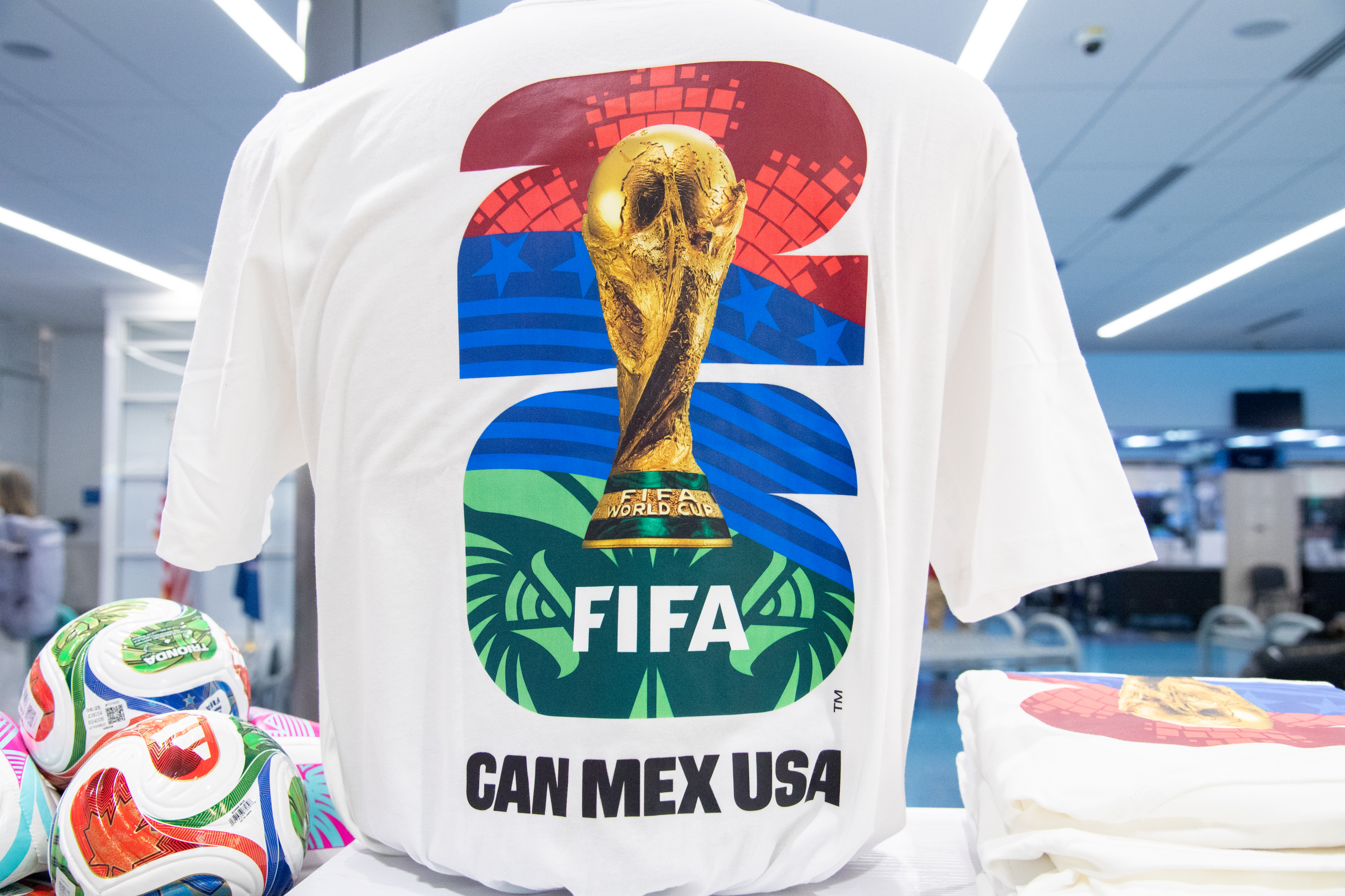 FORT LAUDERDALE, FL - JANUARY 28: FIFA World Cup 26 shirts with the FIFA World Cup 26 logo are on display for sale in a shop on January 28, 2026, at Fort Lauderdale-Hollywood International Airport, in Fort Lauderdale, FL. The 2026 FIFA World Cup host countries are Canada, Mexico, and the United States. (Photo by Erica Denhoff/Icon Sportswire via Getty Images)