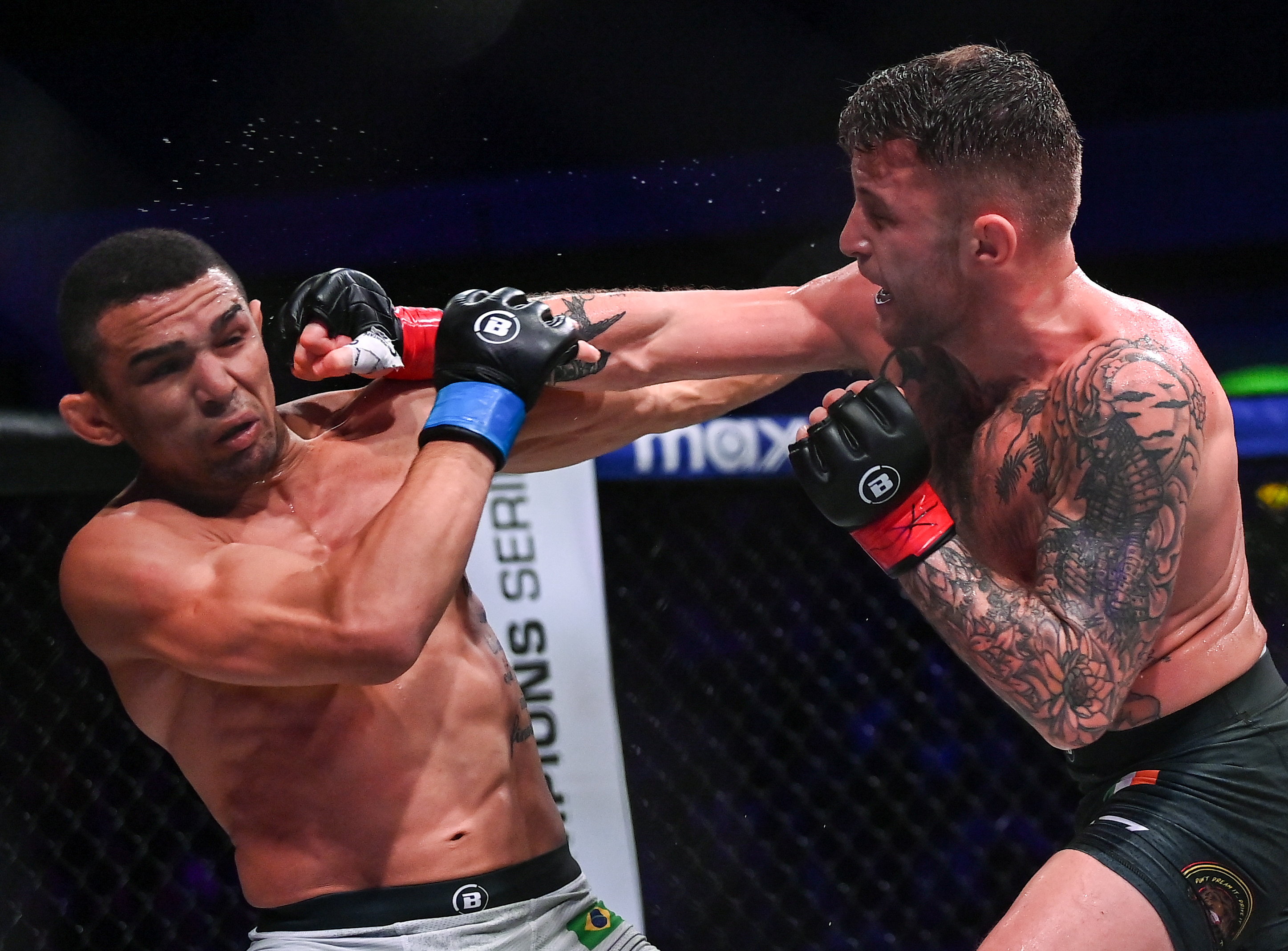Northern Ireland , United Kingdom - 22 March 2024; James Gallagher, right, in action against Leandro Higo in their featherweight bout during the Bellator Champions Series at the SSE Arena in Belfast. (Photo By David Fitzgerald/Sportsfile via Getty Images)