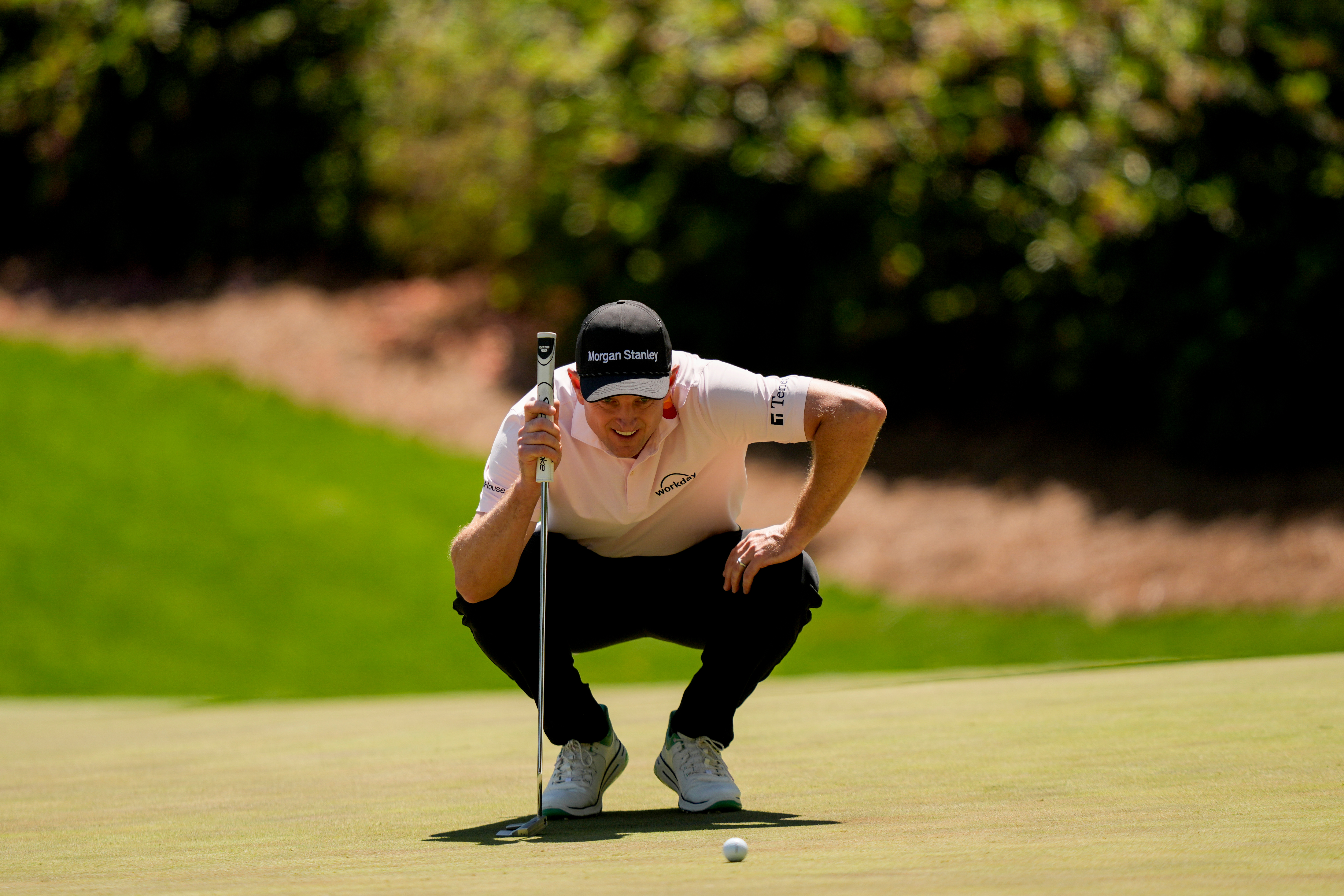 Justin Rose, of England, lines up a putt on the 13th hole during the second round of the Masters golf tournament at the Augusta National Golf Club, Friday, April 10, 2026, in Augusta, Ga. (AP Photo/Matt Slocum)