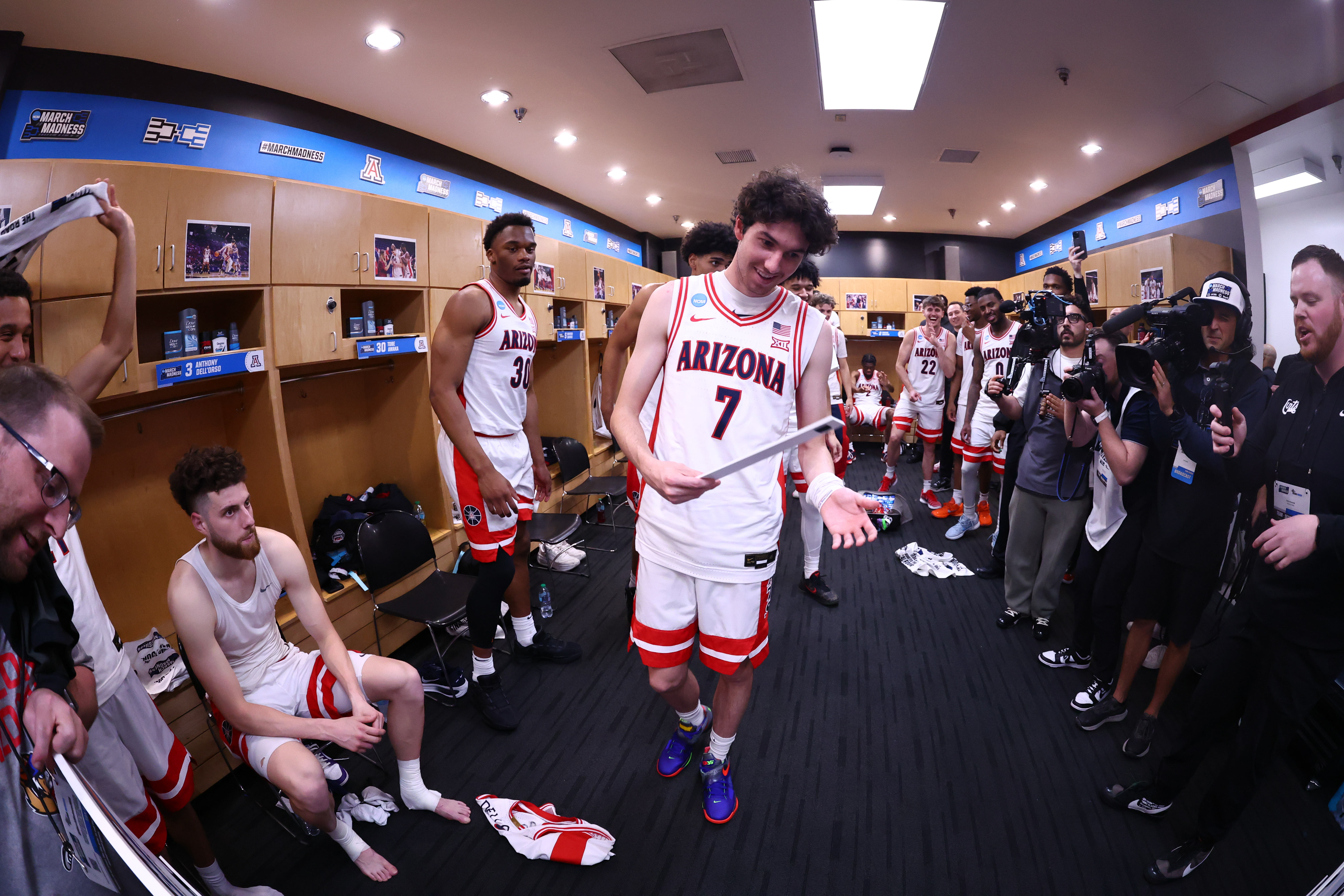 SAN DIEGO, CALIFORNIA - MARCH 22: Jackson Francois #7 of the Arizona Wildcats celebrates with teammates after a victory over the Utah State Aggies during the second round of the 2026 NCAA Men's Basketball Tournament held at Viejas Arena at San Diego State University on March 22, 2026 in San Diego, California.  (Photo by Jamie Schwaberow/NCAA Photos via Getty Images)