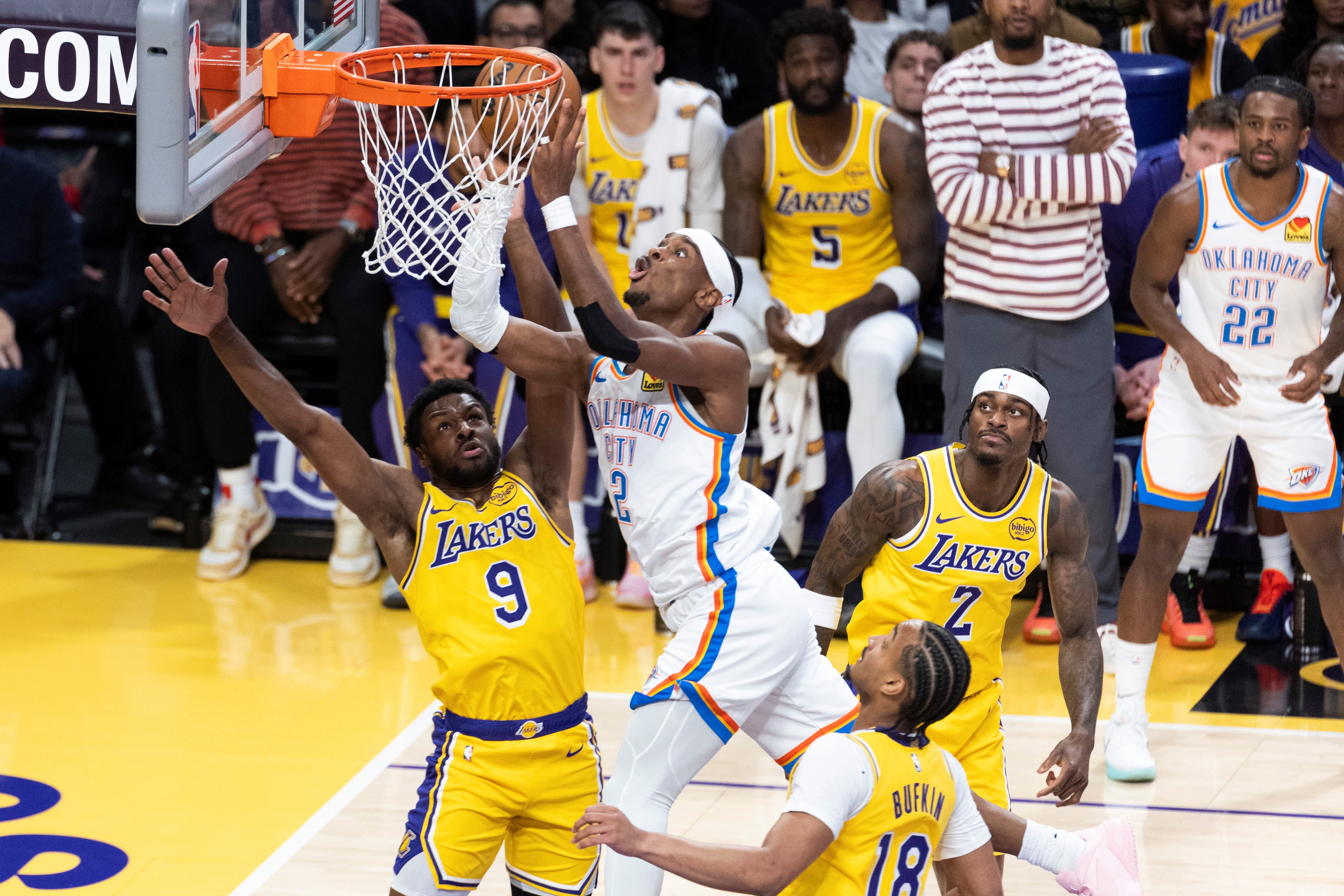 Oklahoma City Thunder's Shai Gilgeous-Alexander top goes for the basket during the 2025-2026 NBA regular season basketball game between Oklahoma City Thunder and Los Angeles Lakers in Los Angeles, the United States, April 7, 2026. (Photo by Ringo Chiu/Xinhua via Getty Images)