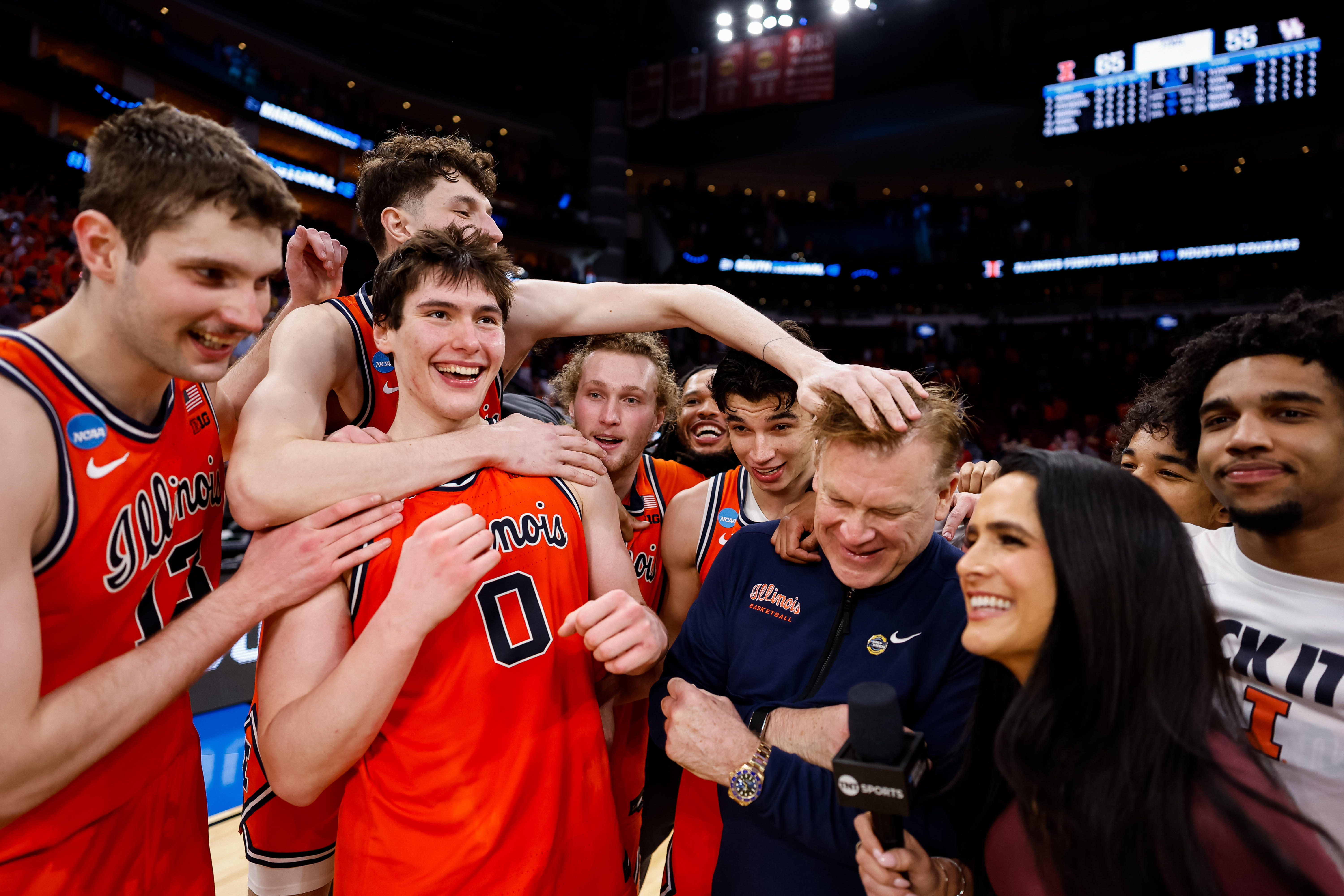 HOUSTON, TEXAS - MARCH 26: Head coach Brad Underwood of the Illinois Fighting Illini and players participate in a television interview on court after the Sweet Sixteen round game of the 2026 NCAA Men's Basketball Tournament held at Toyota Center on March 26, 2026 in Houston, Texas. (Photo by Logan Riely/NCAA Photos via Getty Images)