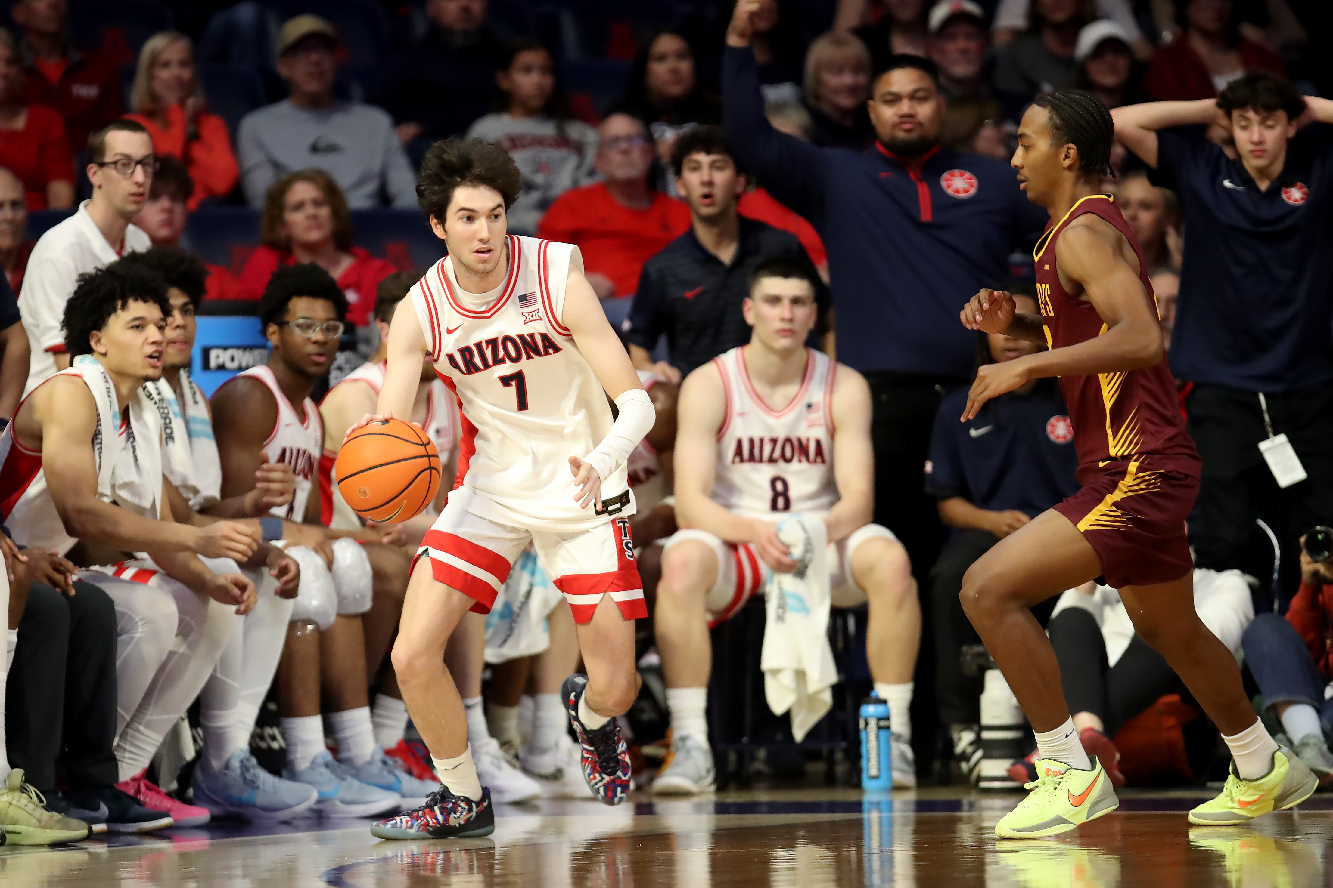 TUCSON, AZ - DECEMBER 22: Arizona Wildcats guard Jackson Francois (7) controls the ball during a men's basketball game between the Bethune-Cookman Wildcats and the Arizona Wildcats on December 22, 2025, at McKale Center in Tucson, AZ.  (Photo by Christopher Hook/Icon Sportswire via Getty Images)