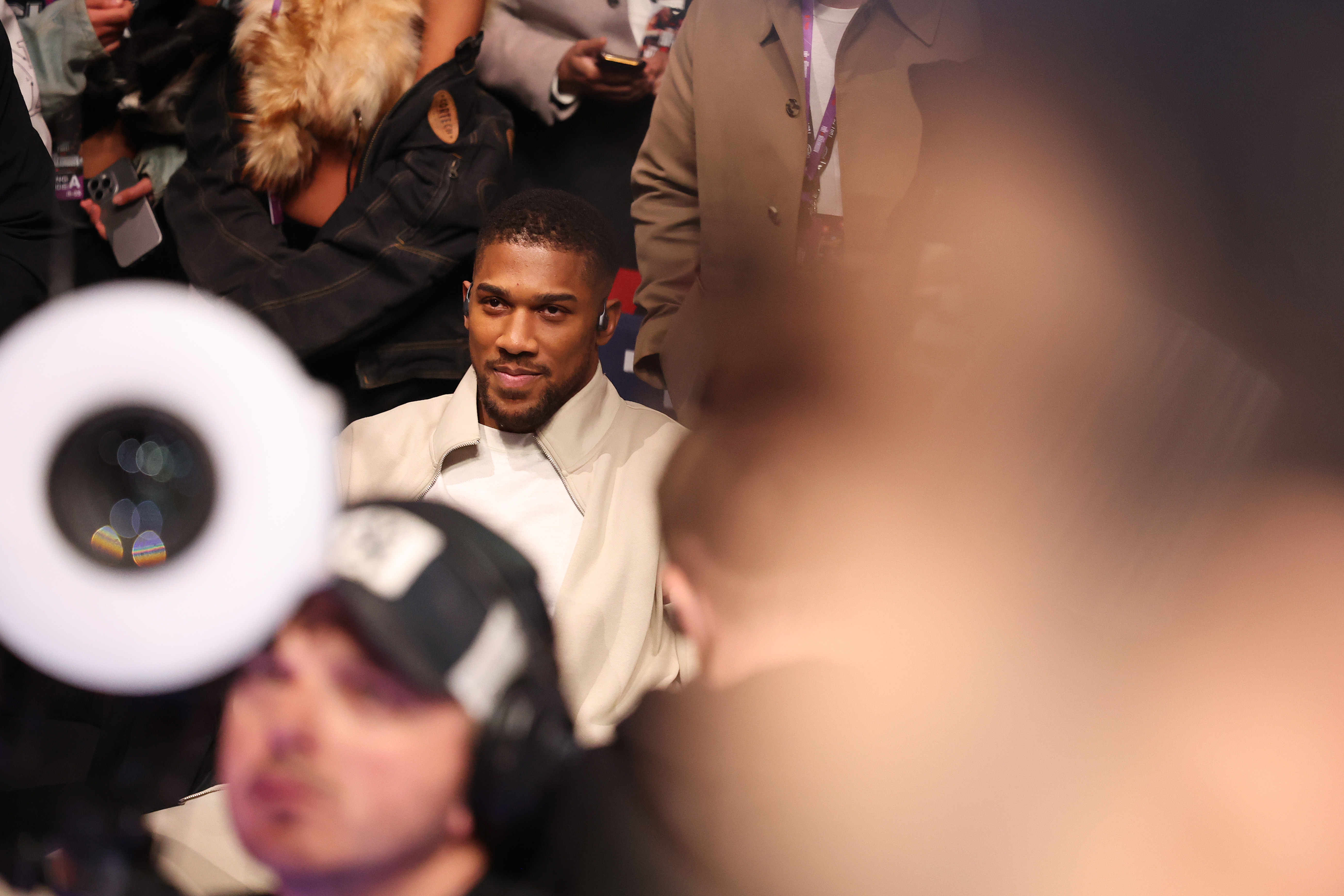 LONDON, ENGLAND - APRIL 11: Anthony Joshua speaks to Tyson Fury (not pictured) after the Heavyweight fight between Tyson Fury and Arslanbek Makhmudov at Tottenham Hotspur Stadium on April 11, 2026 in London, England. (Photo by Richard Pelham/Getty Images for Netflix)