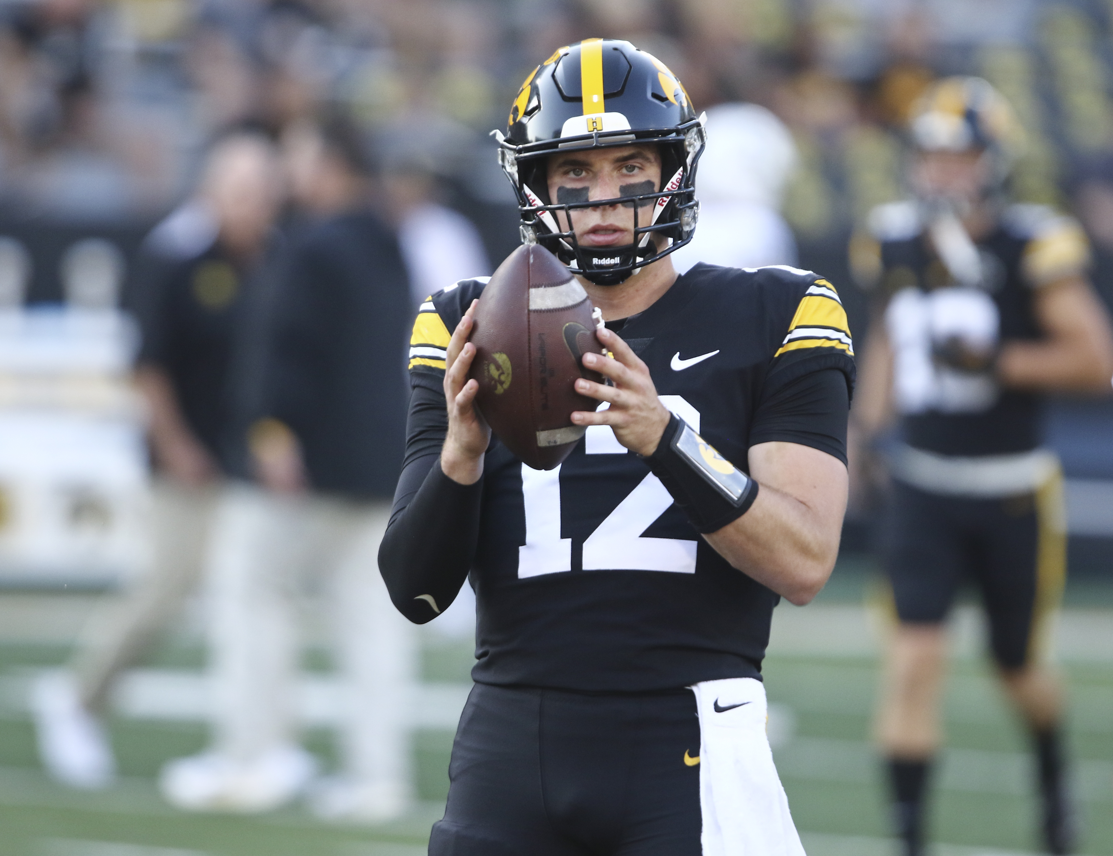 IOWA CITY, IOWA- SEPTEMBER 30:  Quarterback Cade McNamara #12 of the Iowa Hawkeyes warms up before the match-up against the Michigan State Spartans at Kinnick Stadium on September 30, 2023 in Iowa City, Iowa.  (Photo by Matthew Holst/Getty Images)