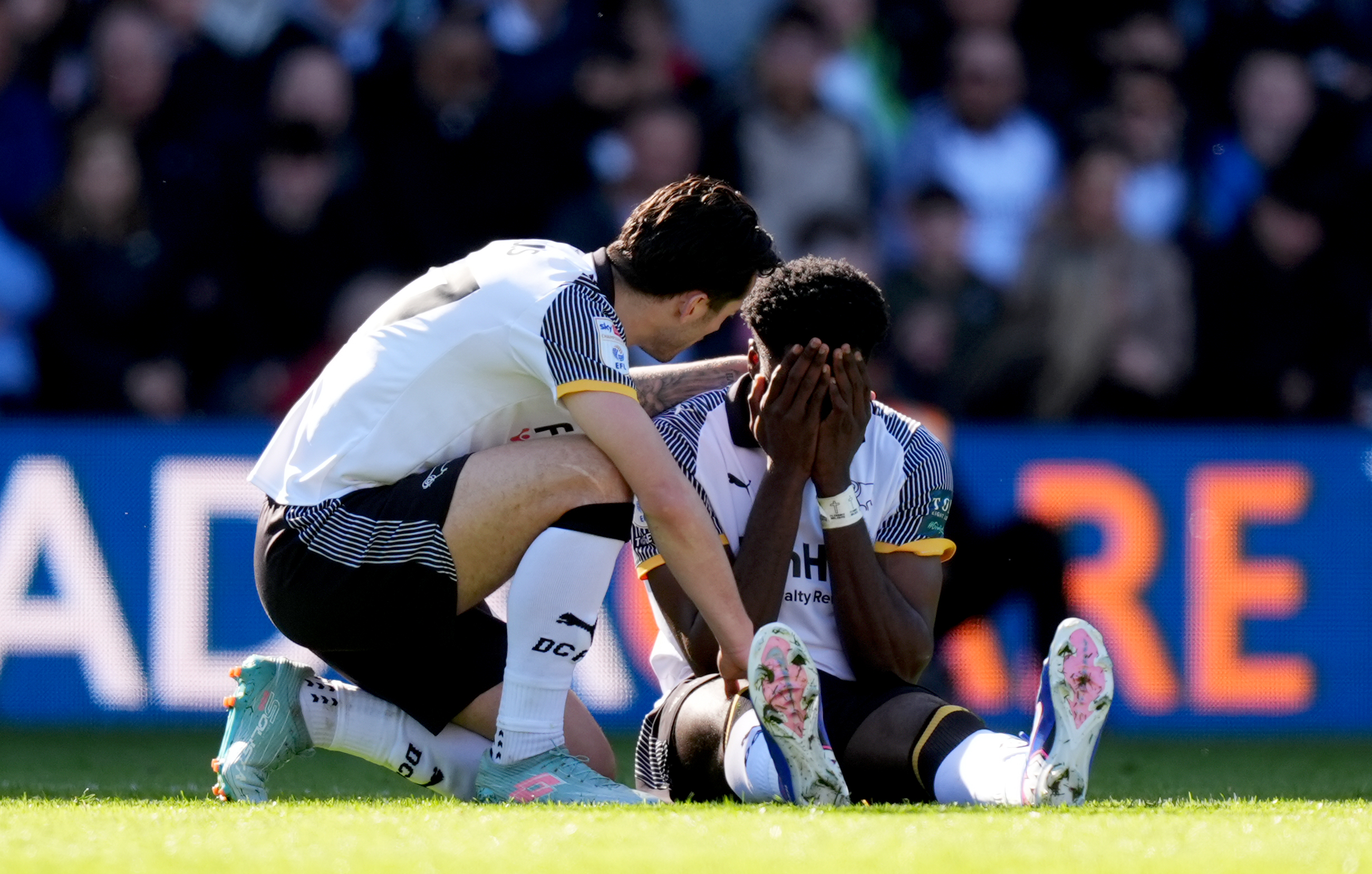 Derby County's Patrick Agyemang (right) holds his head in his hands after picking up an injury during the Sky Bet Championship match at Pride Park, Derby. Picture date: Monday April 6, 2026. (Photo by Mike Egerton/PA Images via Getty Images)