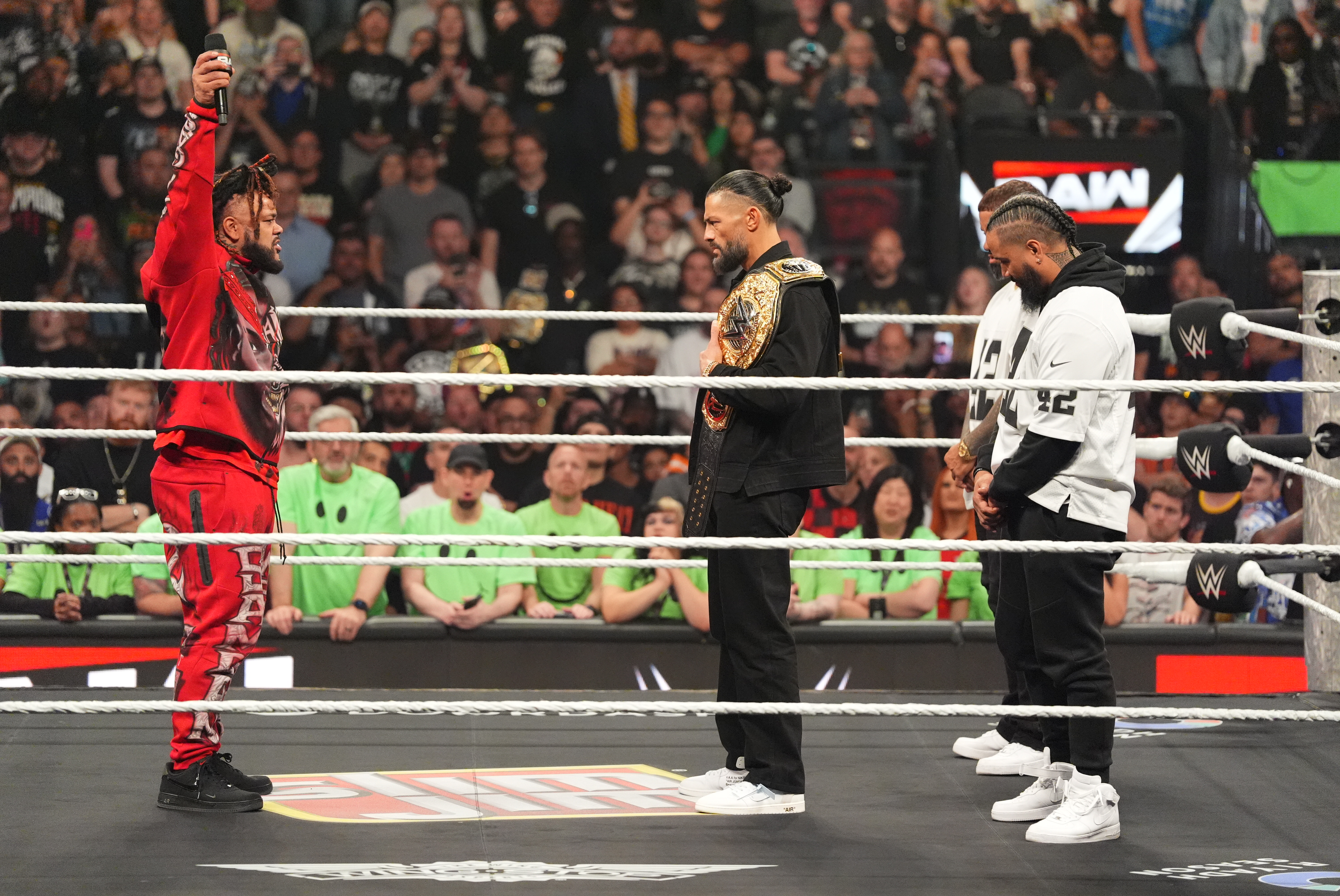 LAS VEGAS, NEVADA - APRIL 20: Jacob Fatu face off against Roman Reigns, Jey Uso, and Jimmy Uso during Monday Night RAW at T-Mobile Arena on April 20, 2026 in Las Vegas, Nevada.  (Photo by Georgiana Dallas/WWE via Getty Images)
