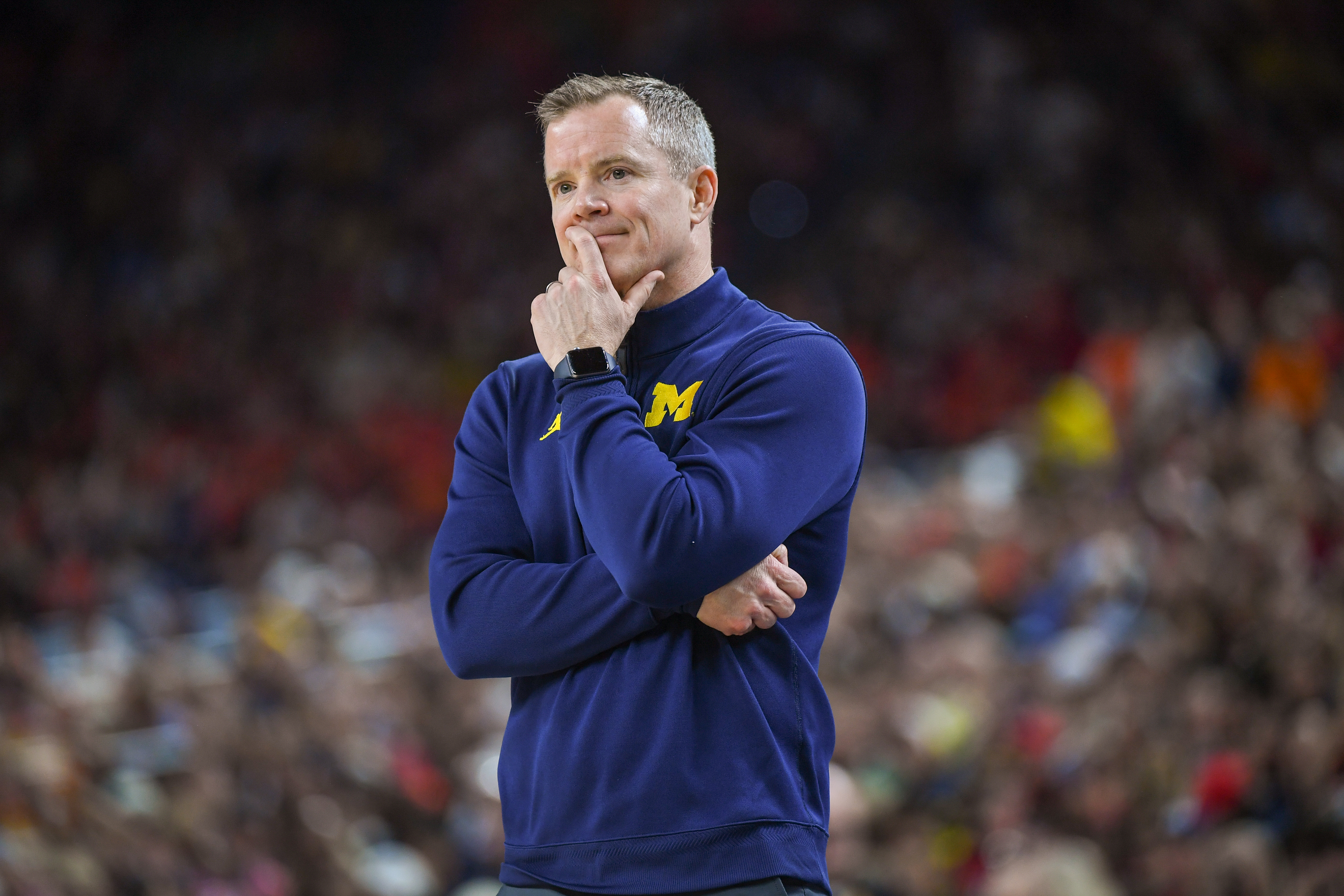 INDIANAPOLIS, INDIANA - APRIL 04: Head Basketball Coach Dusty May of the Michigan Wolverines looks on during the first half of a NCAA Men's Basketball Tournament Final Four game against the Arizona Wildcatsa at Lucas Oil Stadium on April 04, 2026 in Indianapolis, Indiana. The Michigan Wolverines won the game 91-73. (Photo by Aaron J. Thornton/Getty Images)