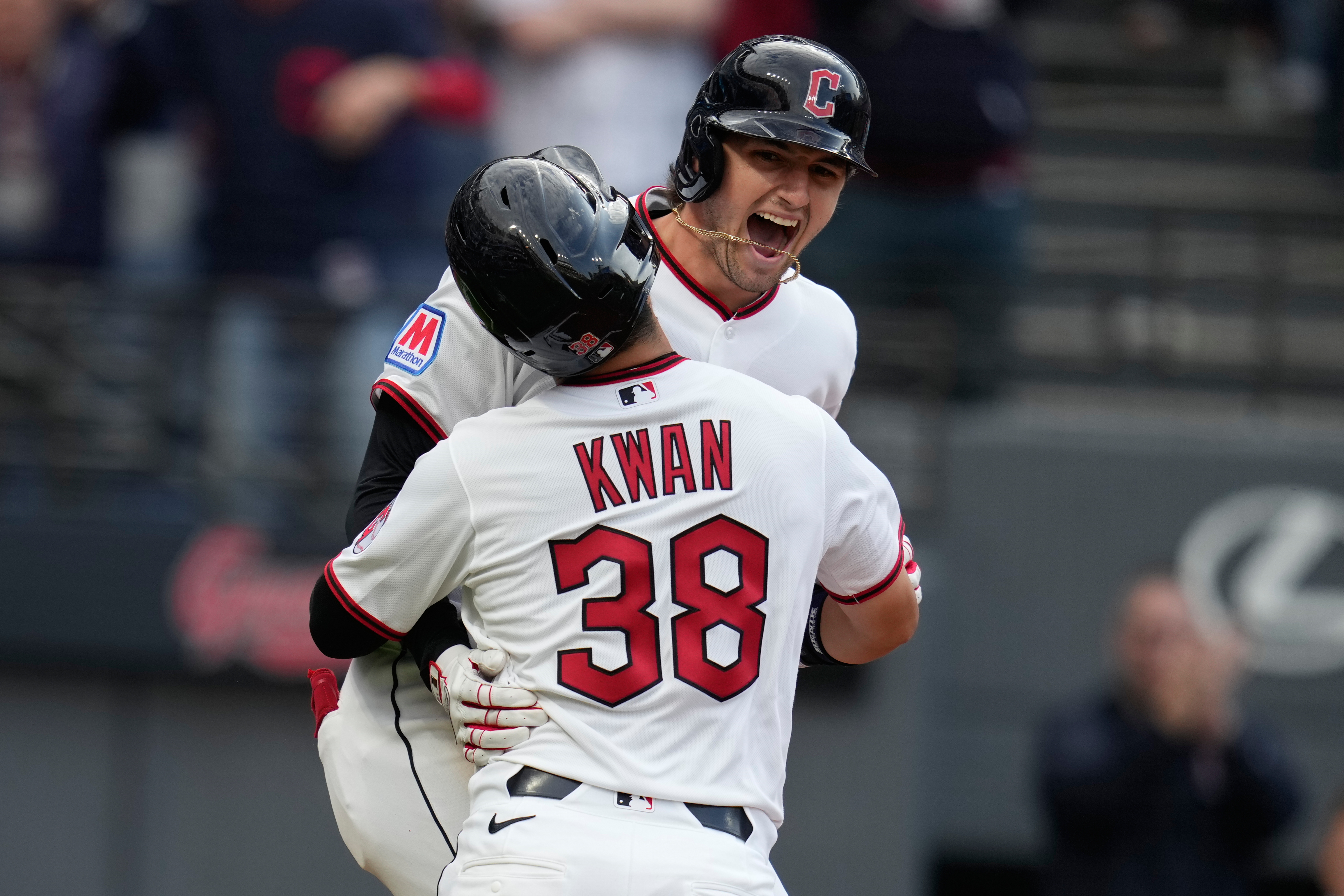 Cleveland Guardians' Chase DeLauter, right, celebrates his home run with Steven Kwan (38) in the seventh inning of a baseball game against the Chicago Cubs in Cleveland, Friday, April 3, 2026. (AP Photo/Sue Ogrocki)
