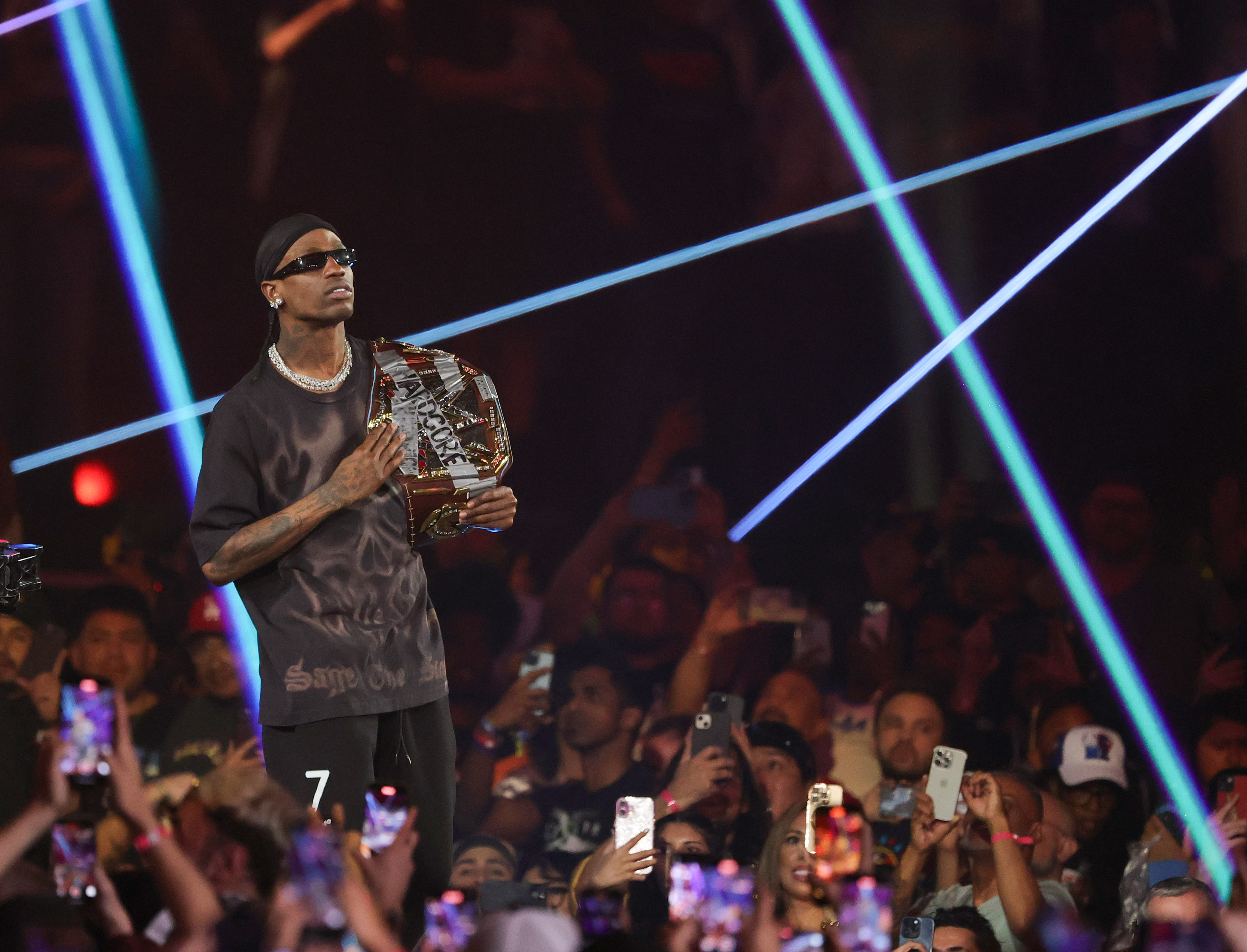 LAS VEGAS, NEVADA - APRIL 20: Rapper Travis Scott walks to the ring during the WWE Championship match between John Cena and Cody Rhodes during WrestleMania 41 at Allegiant Stadium on April 20, 2025 in Las Vegas, Nevada. (Photo by Ethan Miller/Getty Images)