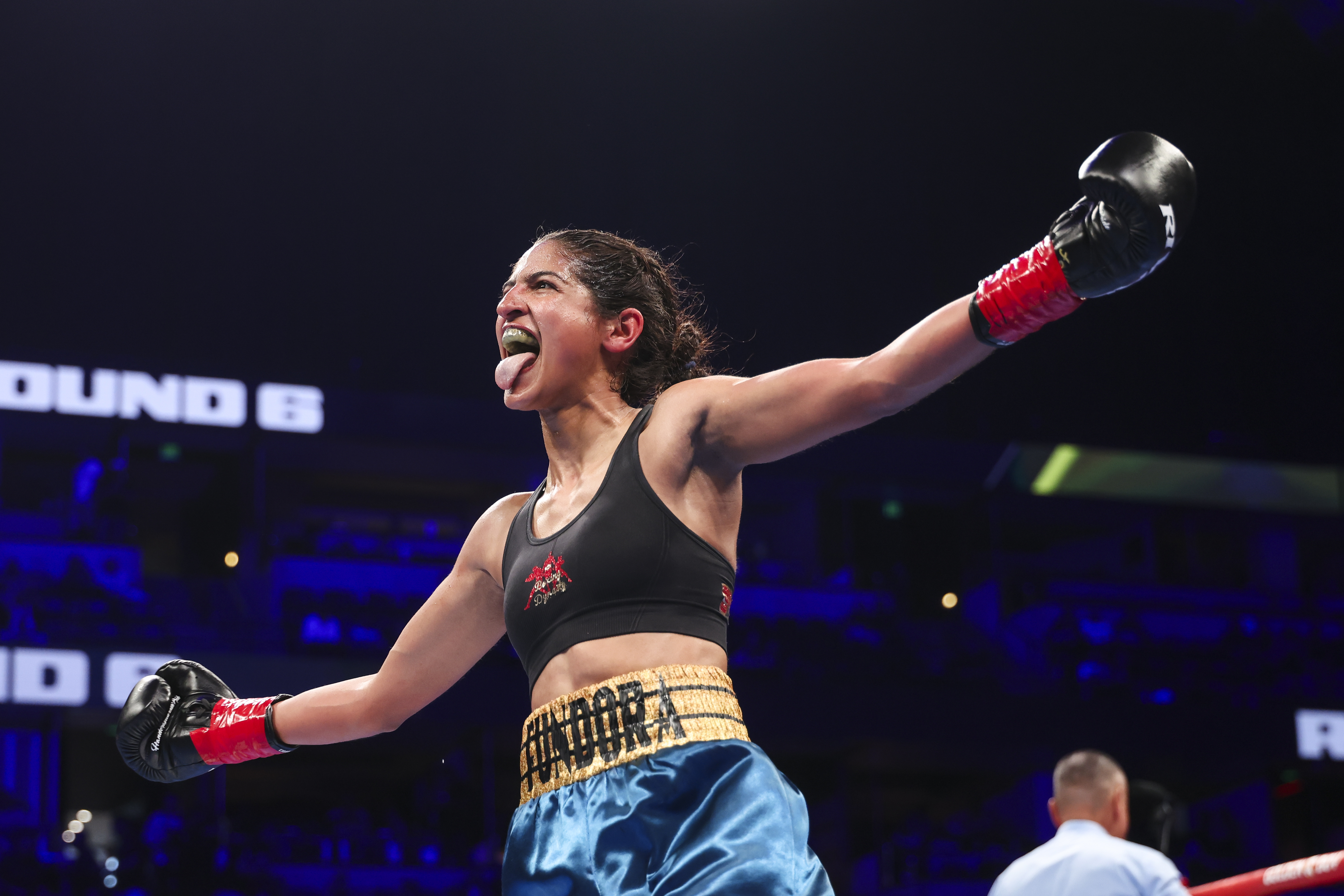 ANAHEIM, CALIFORNIA - MARCH 14: Gabriela Fundora celebrates her IBF WBA WBC & WBO World Flyweight Title victory over Viviana Ruiz at Honda Center on March 14, 2026 in Anaheim, California. (Photo by Cris Esqueda/Golden Boy/Getty Images)