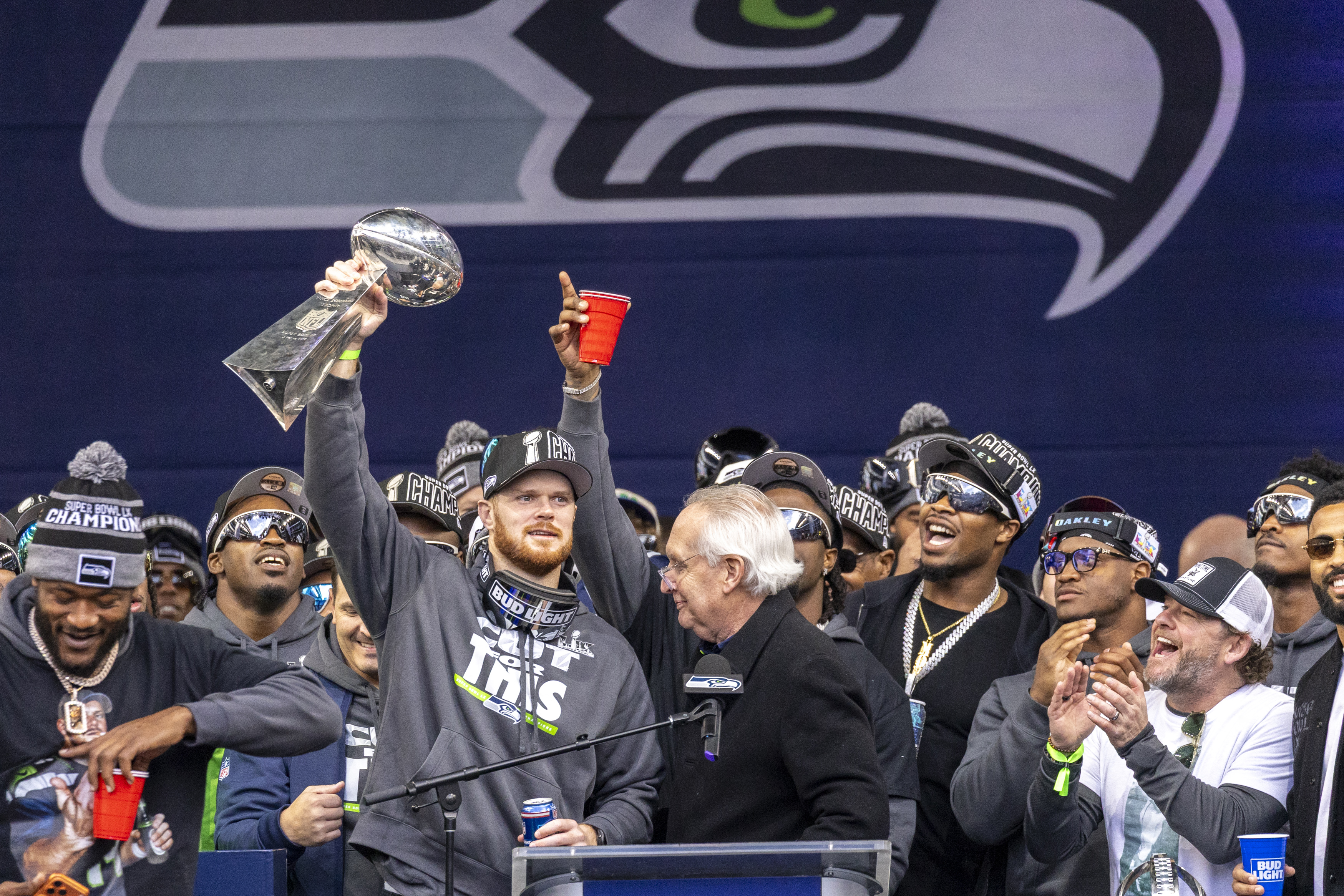 Sam Darnold of the Seattle Seahawks holds up the Vince Lombardi Trophy during a Super Bowl LX trophy celebration at Lumen Field in Seattle, Washington, on February 11, 2026. (Photo by Jason Redmond / AFP via Getty Images)