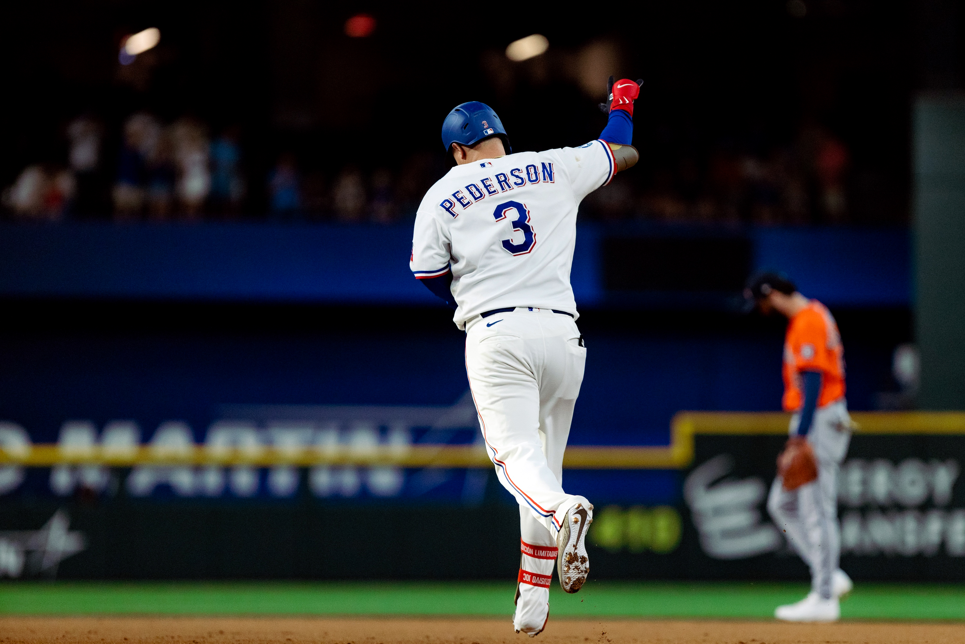 ARLINGTON, TX - MAY 26: Joc Pederson #3 of the Texas Rangers rounds the bases after hitting a three run home run in the first inning during the game between the Houston Astros and the Texas Rangers at Globe Life Field on Tuesday, May 26, 2026 in Arlington, Texas. (Photo by Kelcee Skoug/MLB Photos via Getty Images)