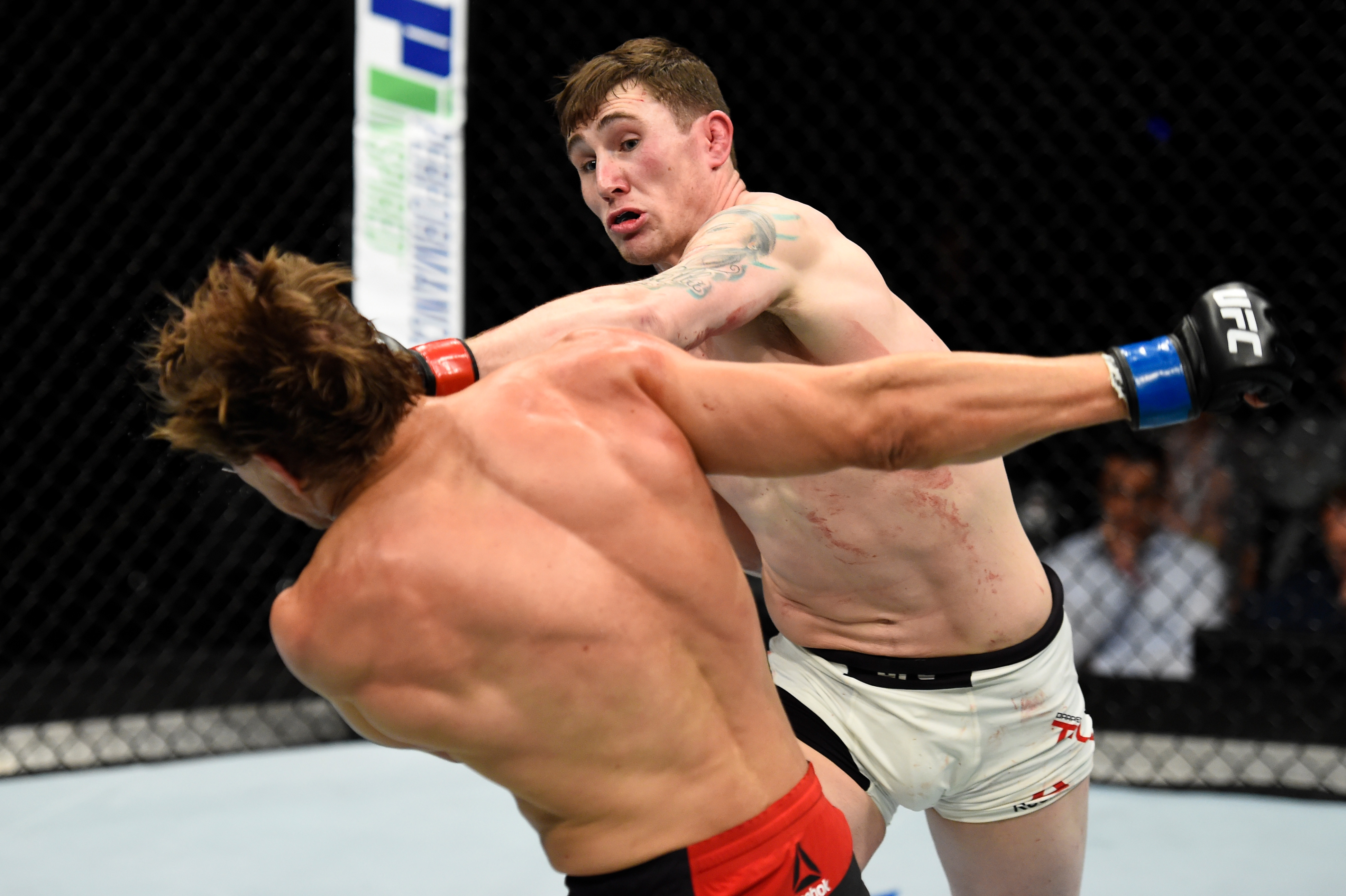 ROTTERDAM, NETHERLANDS - SEPTEMBER 02:  (R-L) Darren Till of England punches Bojan Velickovic of Serbia in their welterweight bout during the UFC Fight Night event at the Rotterdam Ahoy on September 2, 2017 in Rotterdam, Netherlands. (Photo by Josh Hedges/Zuffa LLC/Zuffa LLC via Getty Images)